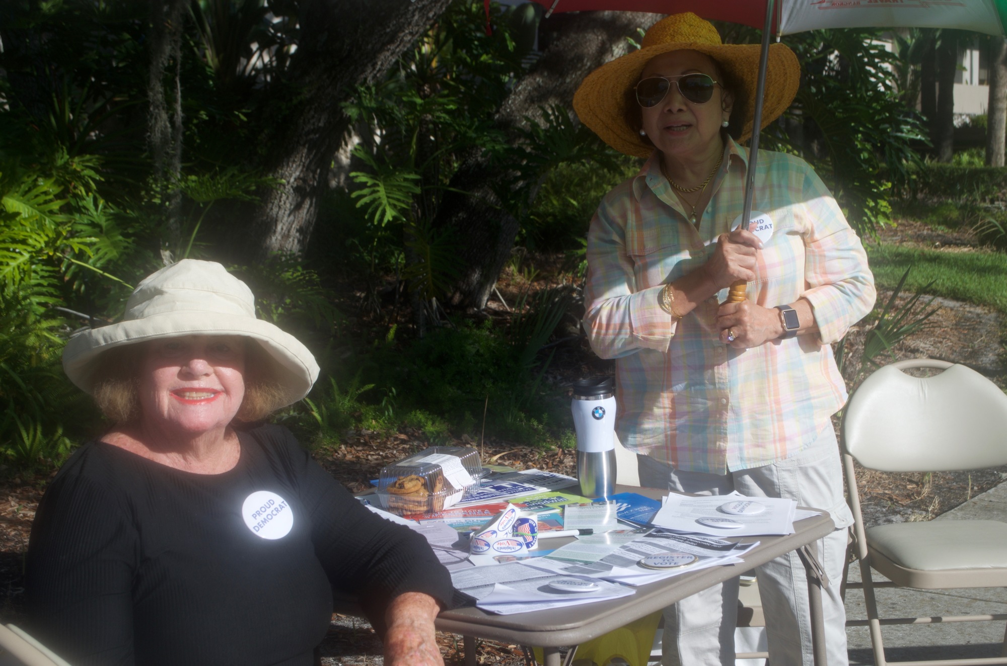 Phyllis Ploener and Tessie Jose greet voters at Longboat municipal building.