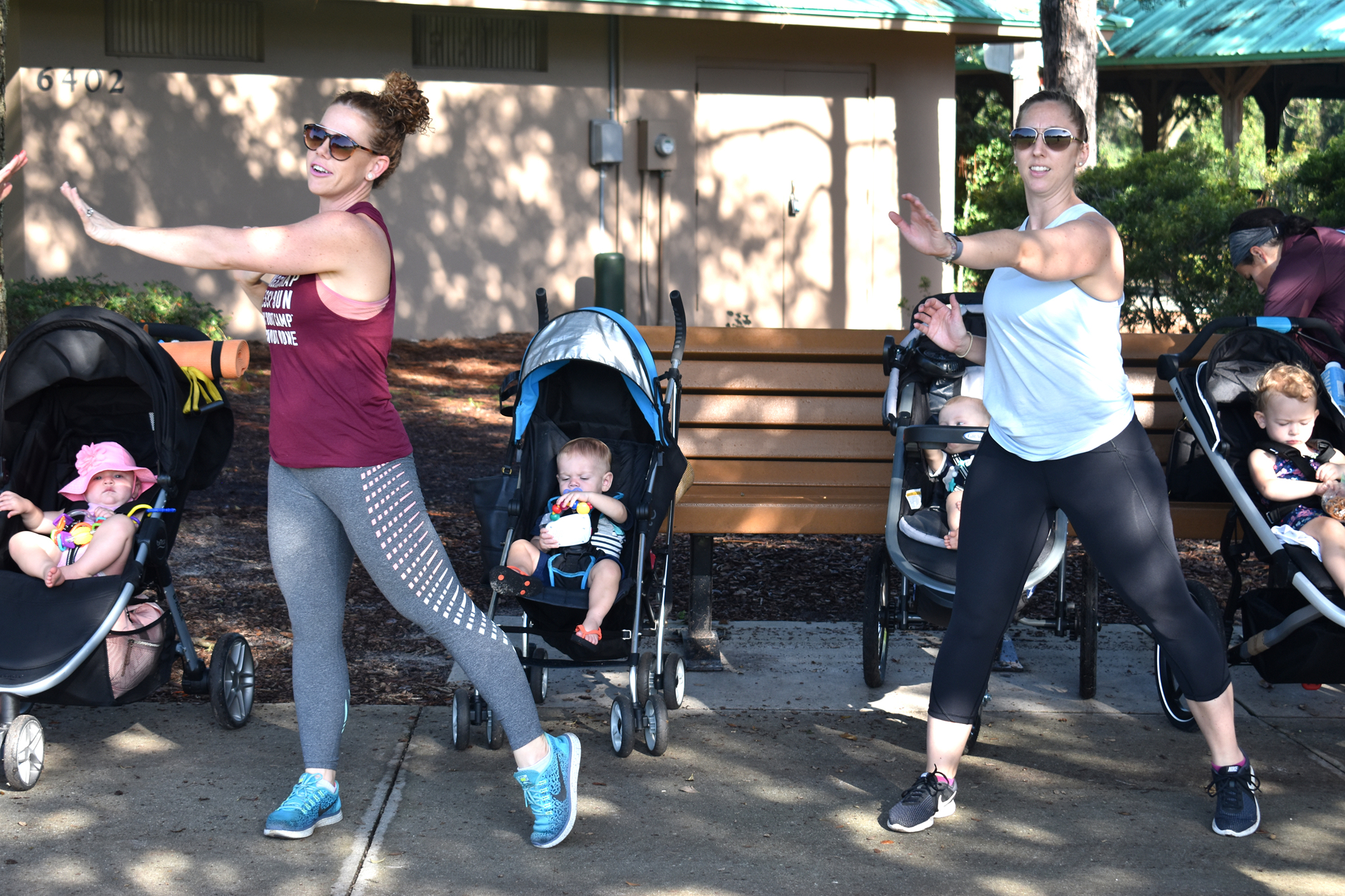 Rebecca Siff & Stephanie McDonald warm up during Baby Boot Camp.