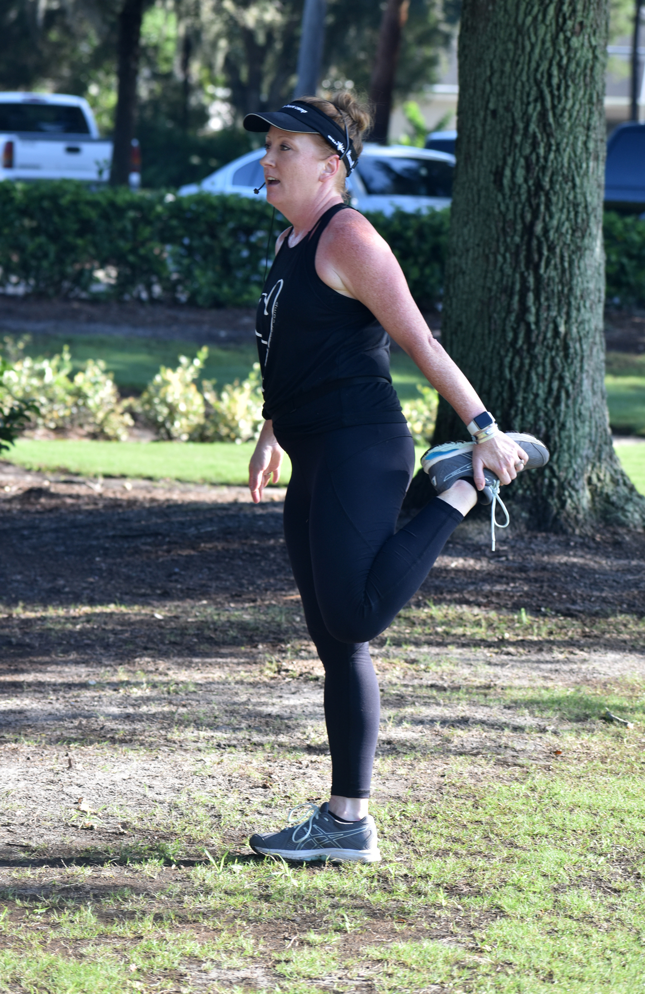 Haley Wells leads moms through a Baby Boot Camp warm up.