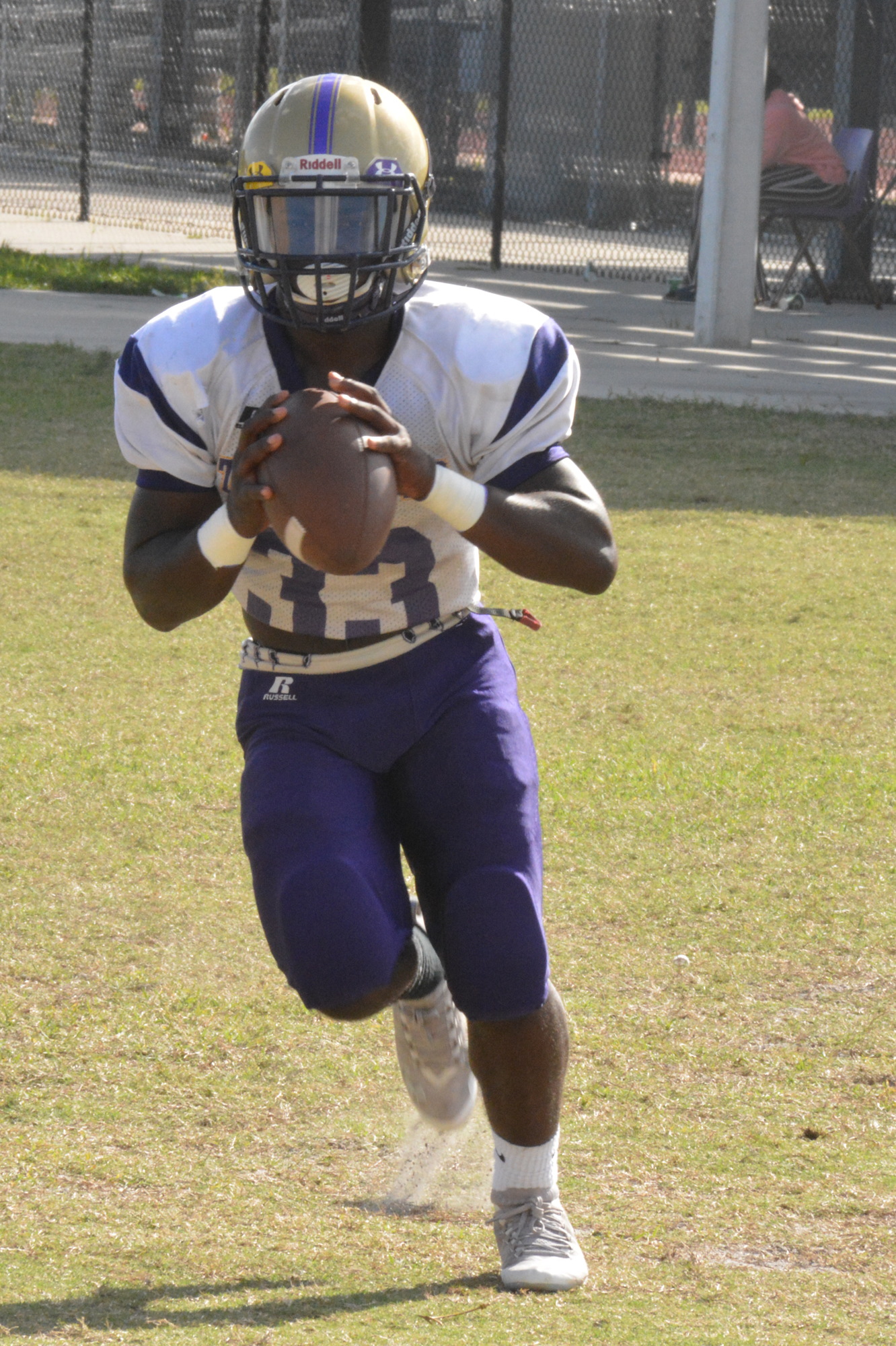 Booker High freshman Cleve Benson runs the option during practice on Oct. 16. He'll start at QB for the Tornadoes on Friday against Lemon Bay High.