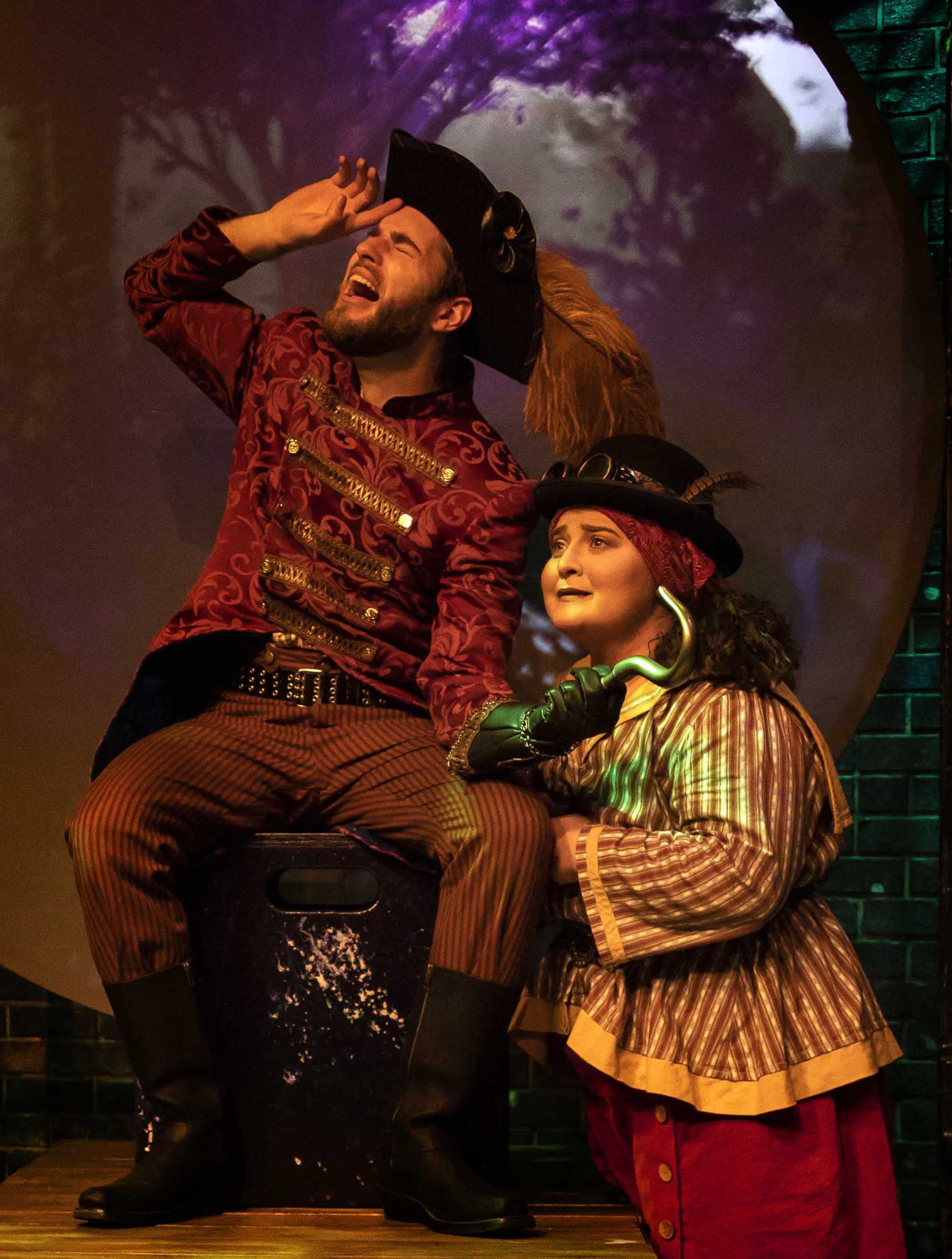 Ben Southerland plays Captain Hook (as well as Nana, Slightly and Tinkerbell) and Kayla Fainer plays Smee (along with  Mrs. Darling, Curly and Tinkerbell) in “Peter Pan.” Courtesy photo