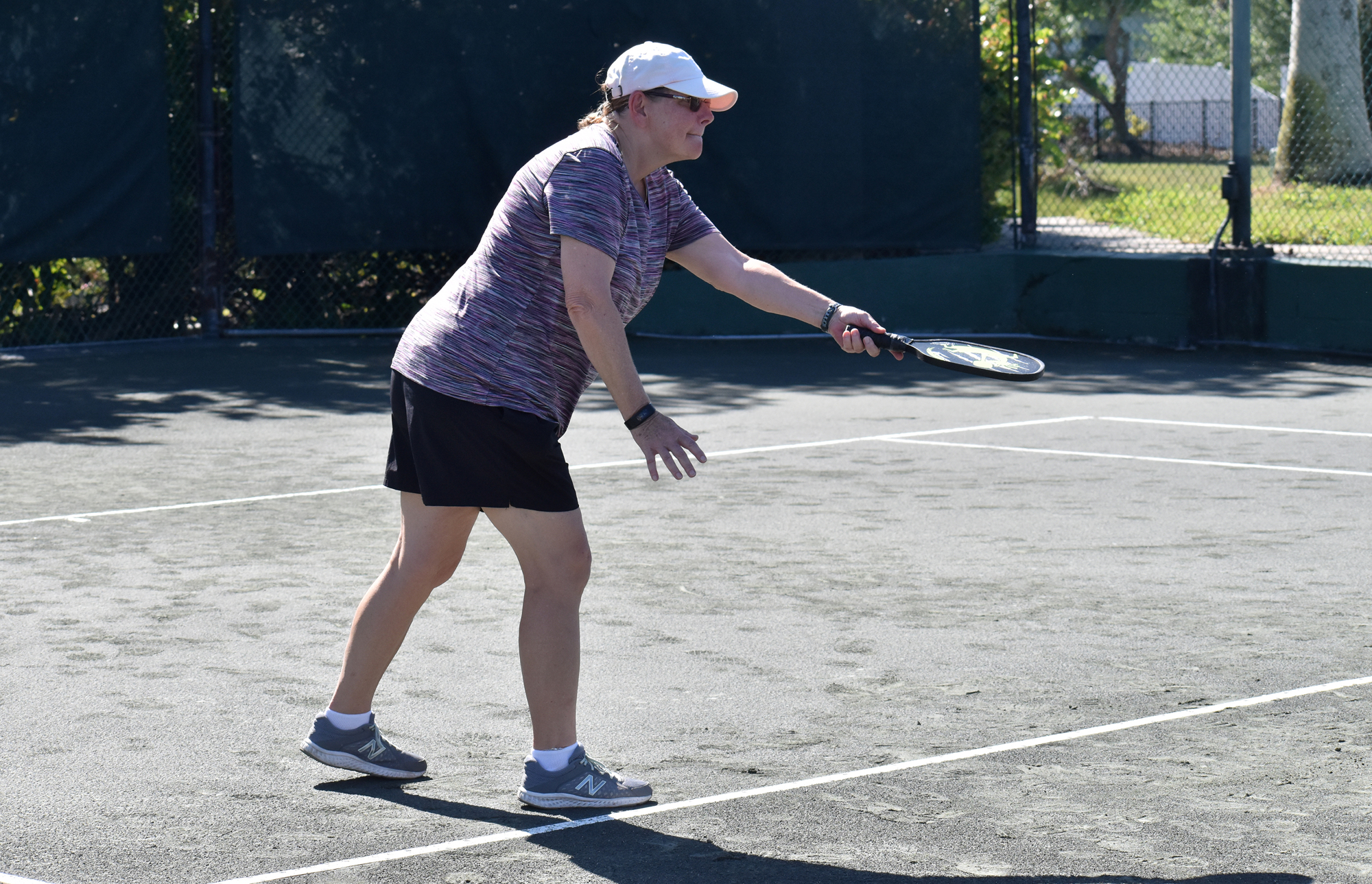Deb Weber plays beckyball, a game created by Yoram Ariely that combines pickleball and tennis.