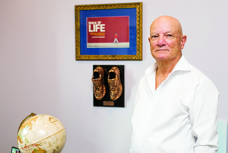 Richard Albero’s office is filled with memorabilia representing his walk, alongside Yankees statuettes, cards and pictures.