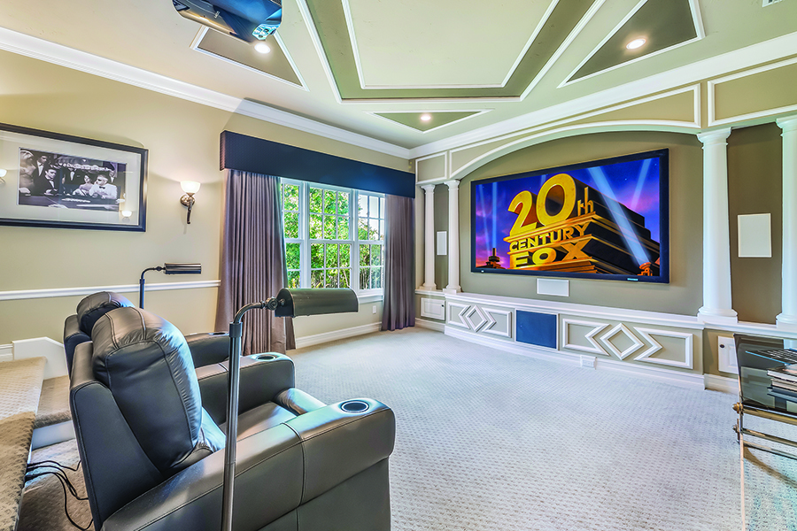 The theater room is windowed and could also function as an extra bedroom.