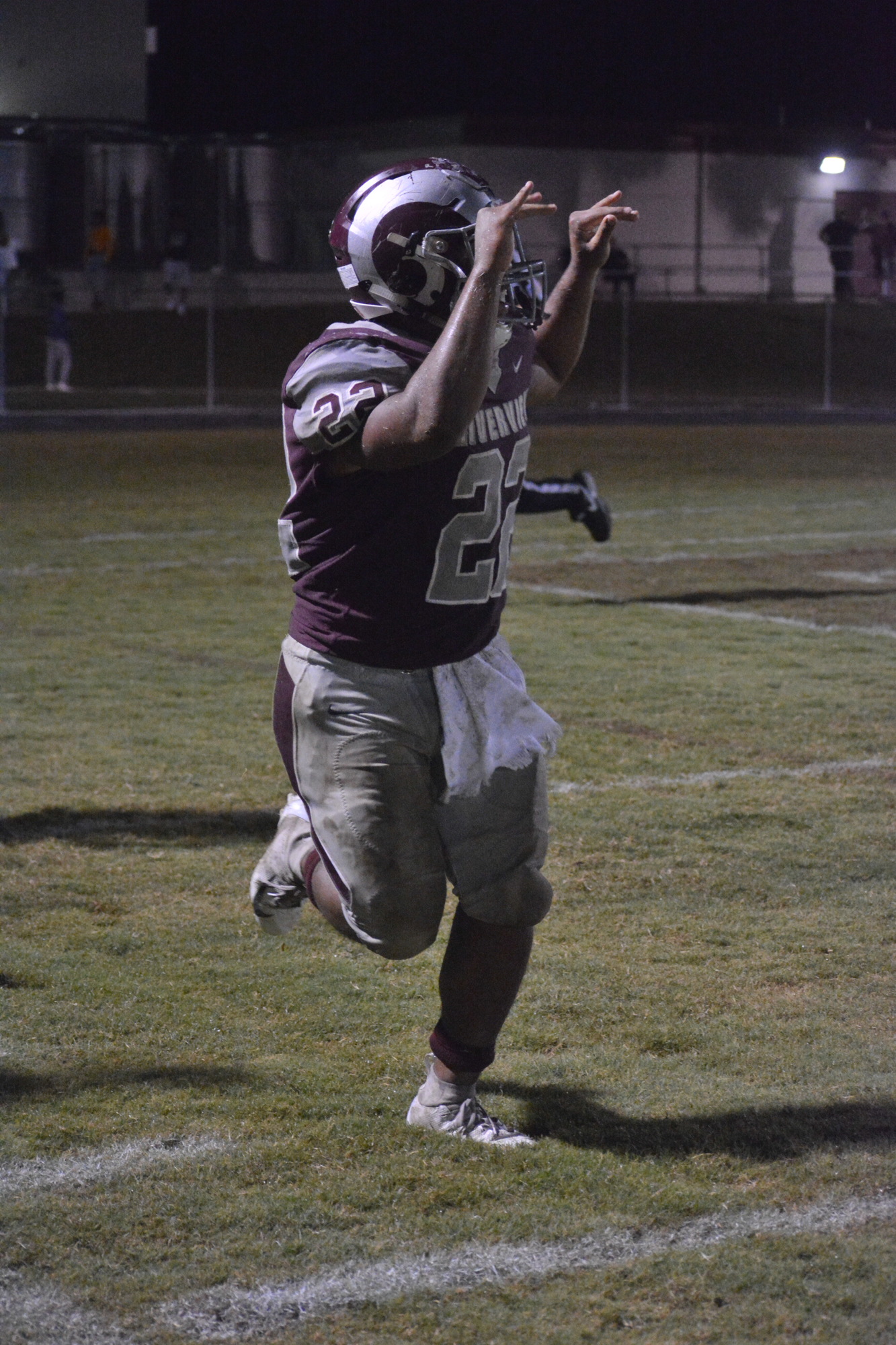 Ali Boyce waves goodbye to the Panthers after scoring a touchdown.