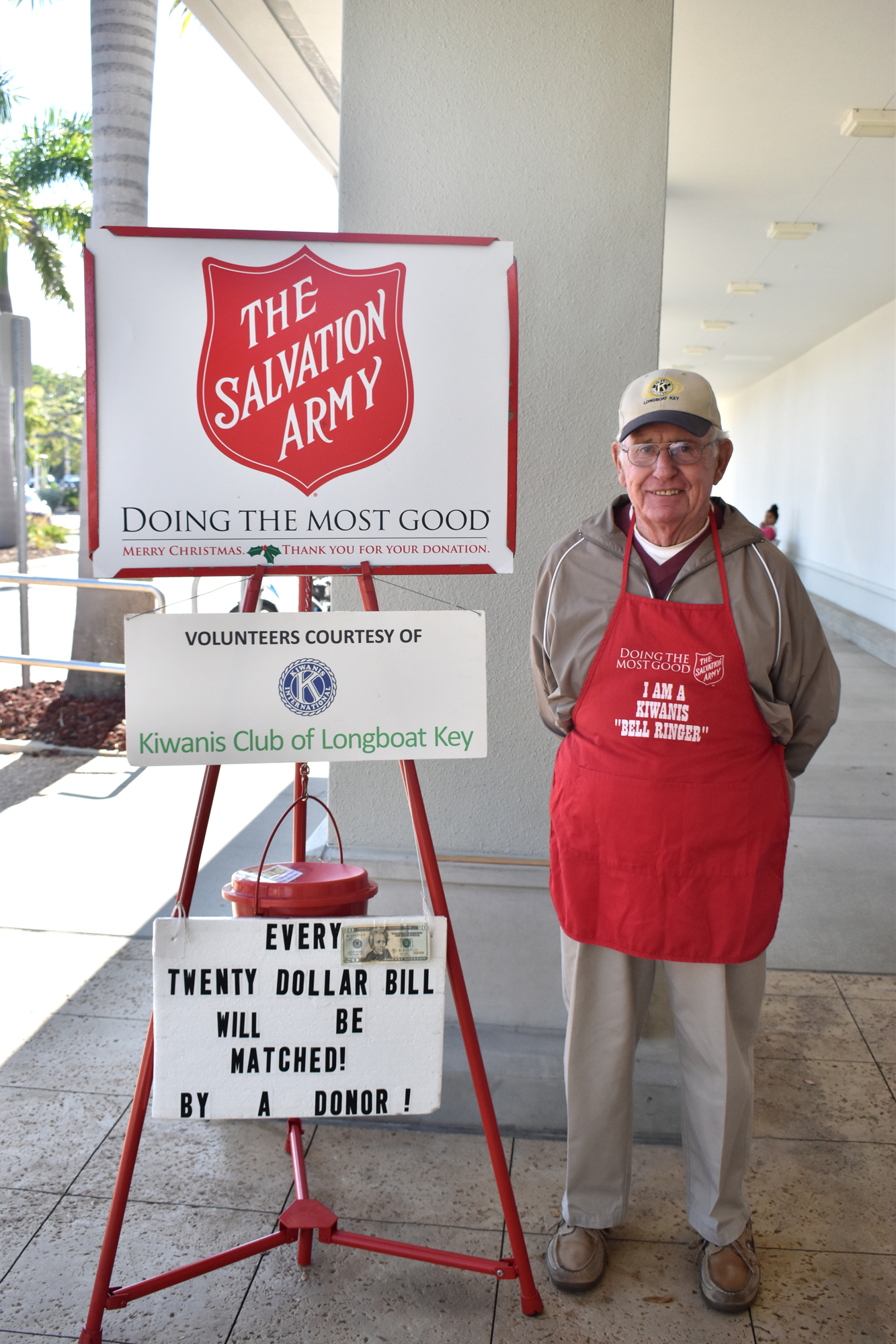 Cash Register volunteers to ring the bell for the Salvation Army's Red Kettle Campaign.
