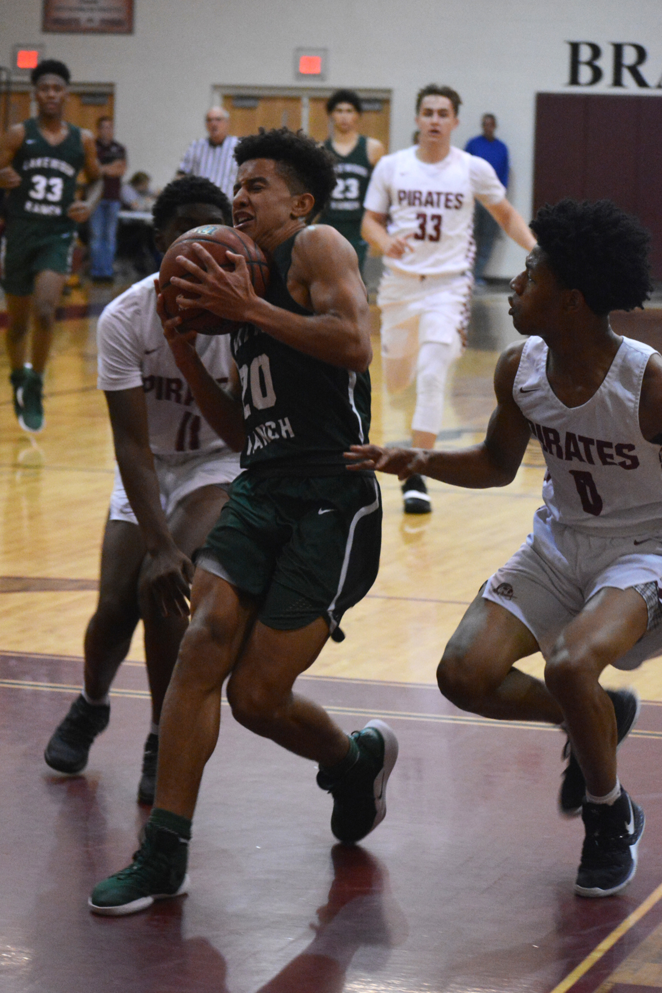 Mustangs junior Keon Buckley drives to the hoop against Braden River. He had 30 points in the game.