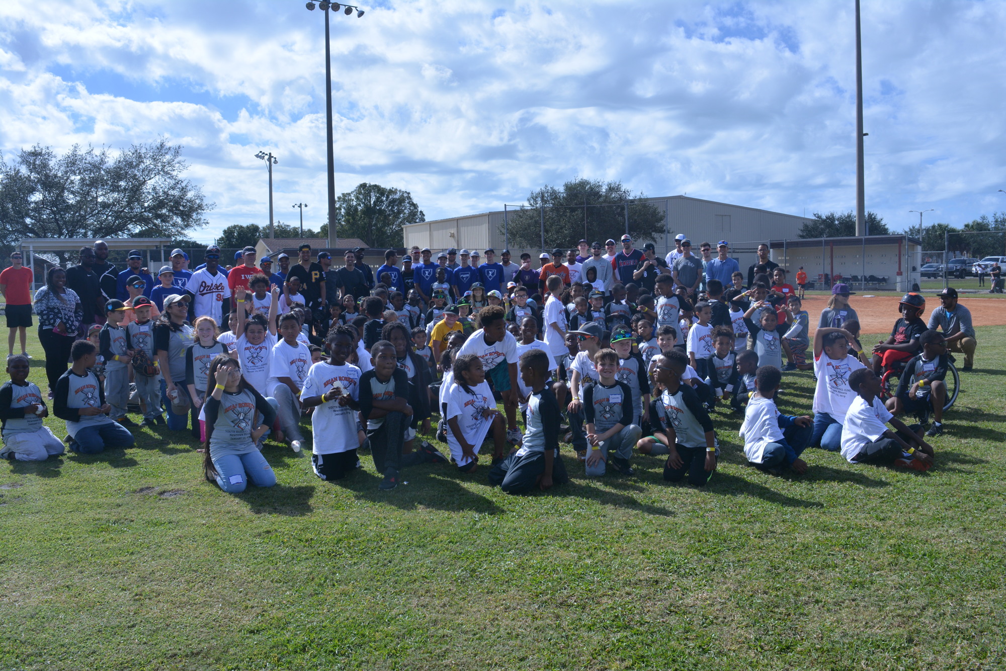 Participants and coaches at the Brian Roberts Youth Baseball Clinic.