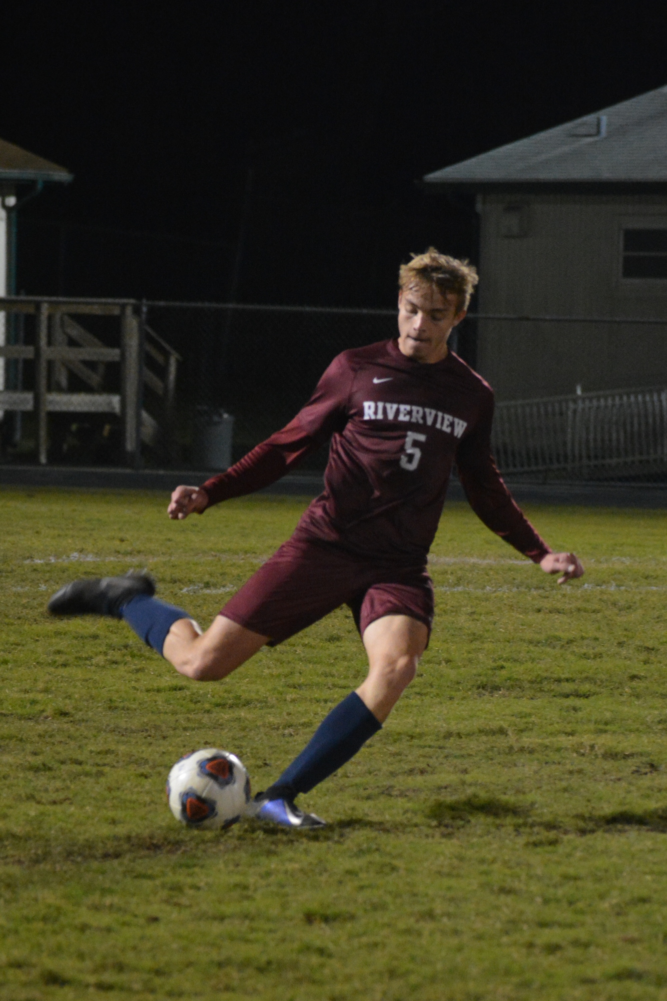 Riverview junior defender Kris Selberg boots a ball downfield.