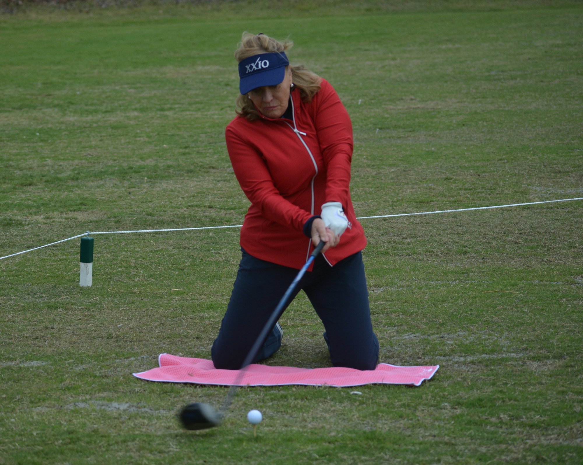 Jan Stephenson hit the ball more than 180 yards from her knees.