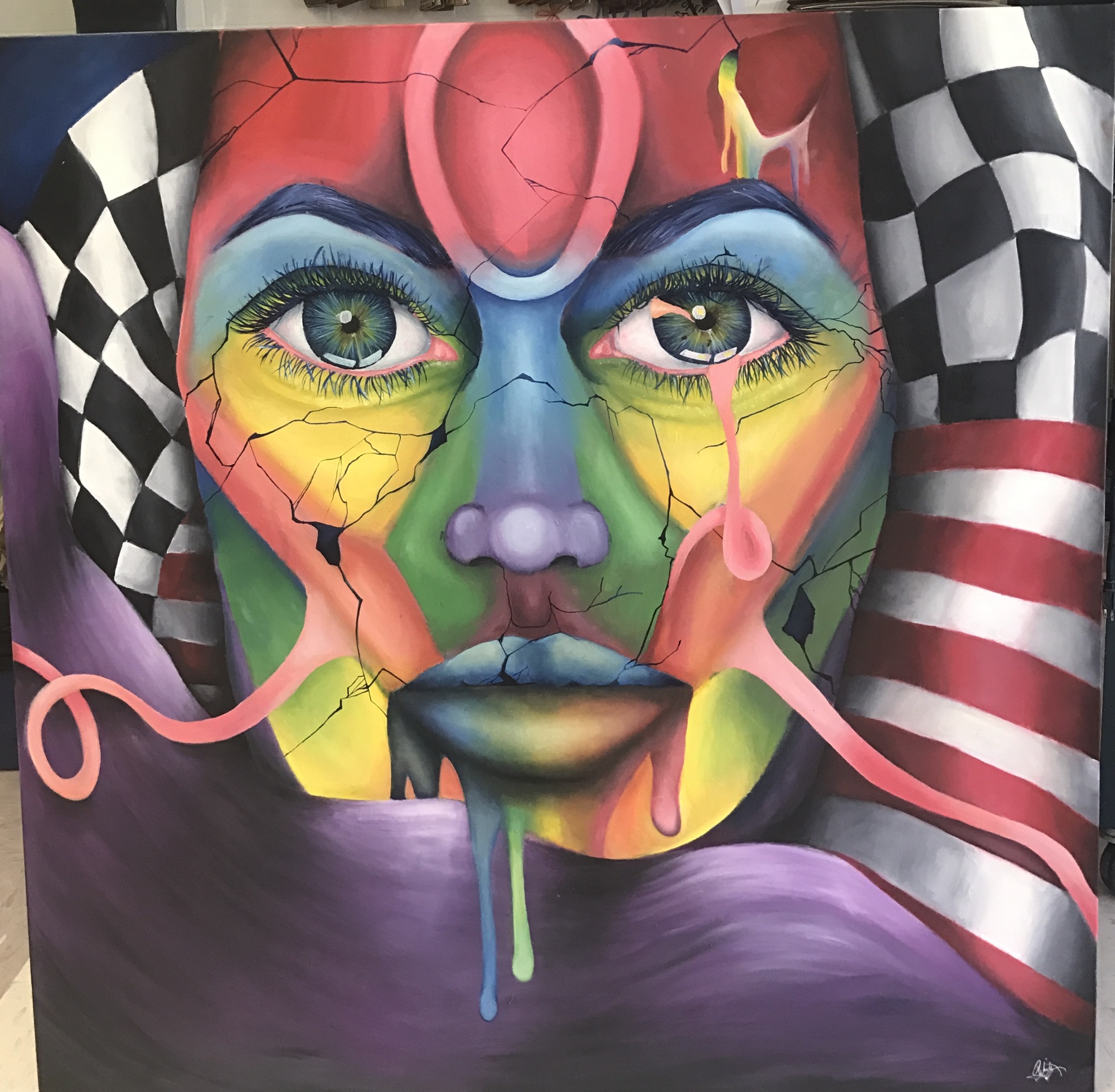 Lakewood Ranch High senior Rheana White's favorite painting, depicting a woman's face on checkerboard and an American flag. Courtesy photo.