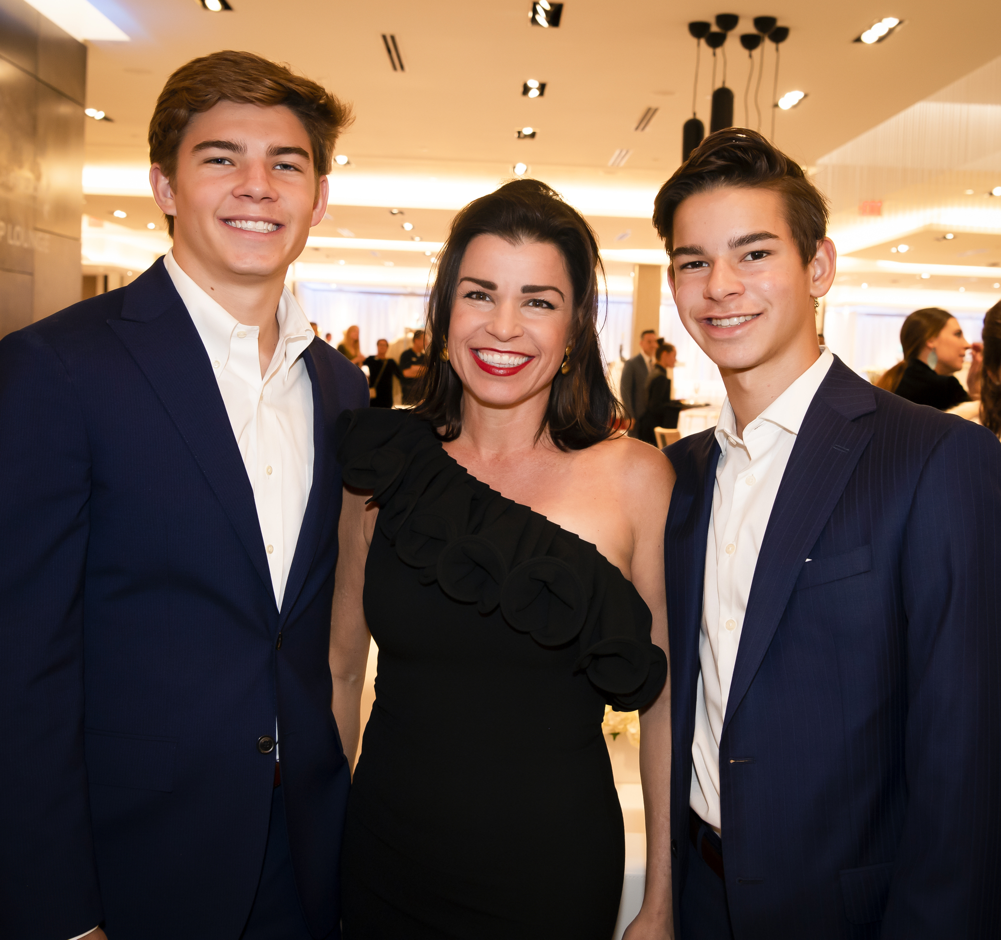 Maximilian Fisher, CEO and President Elizabeth Melendez Fisher and Leopold Fisher. Photo by Cliff Roles.