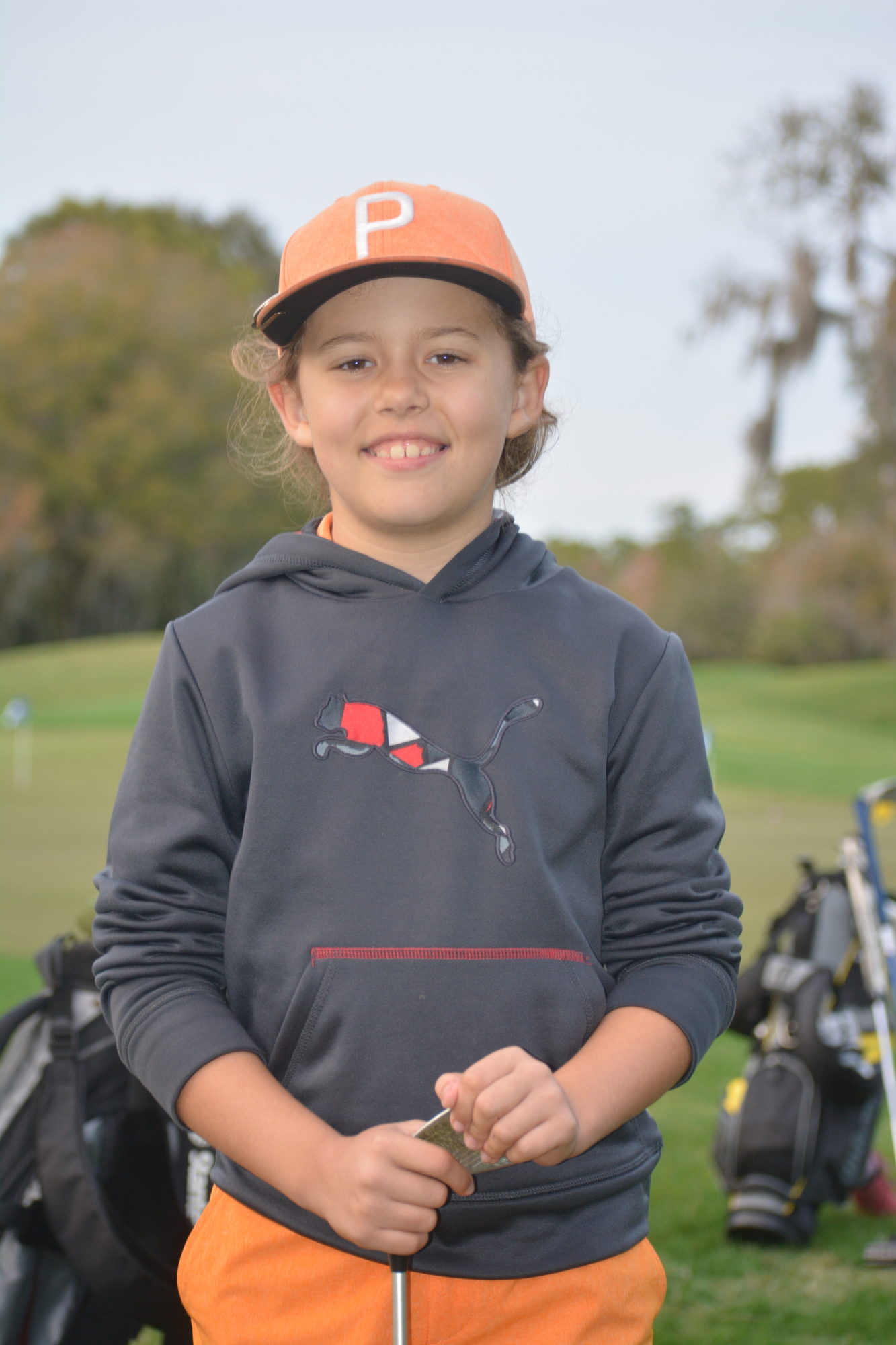 Rosedale Golf and Country Club's Phoenix Scanlan, 10, loves The First Tee's mix of seriousness and fun.