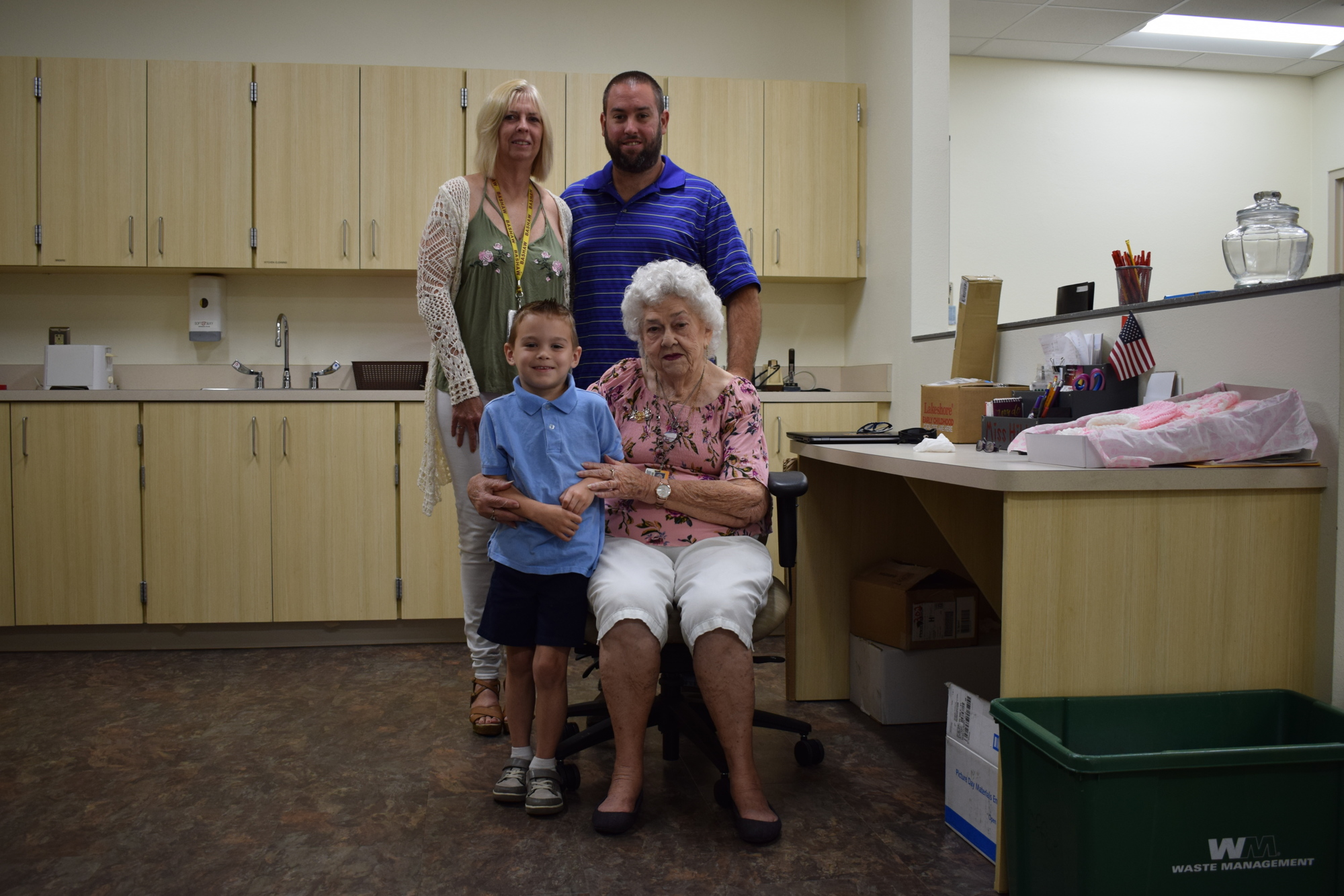 Susan Meiler stands with her son, Ryan Meiler, behind her grandson Daniel Meiler and mother Hilda Hamrick.