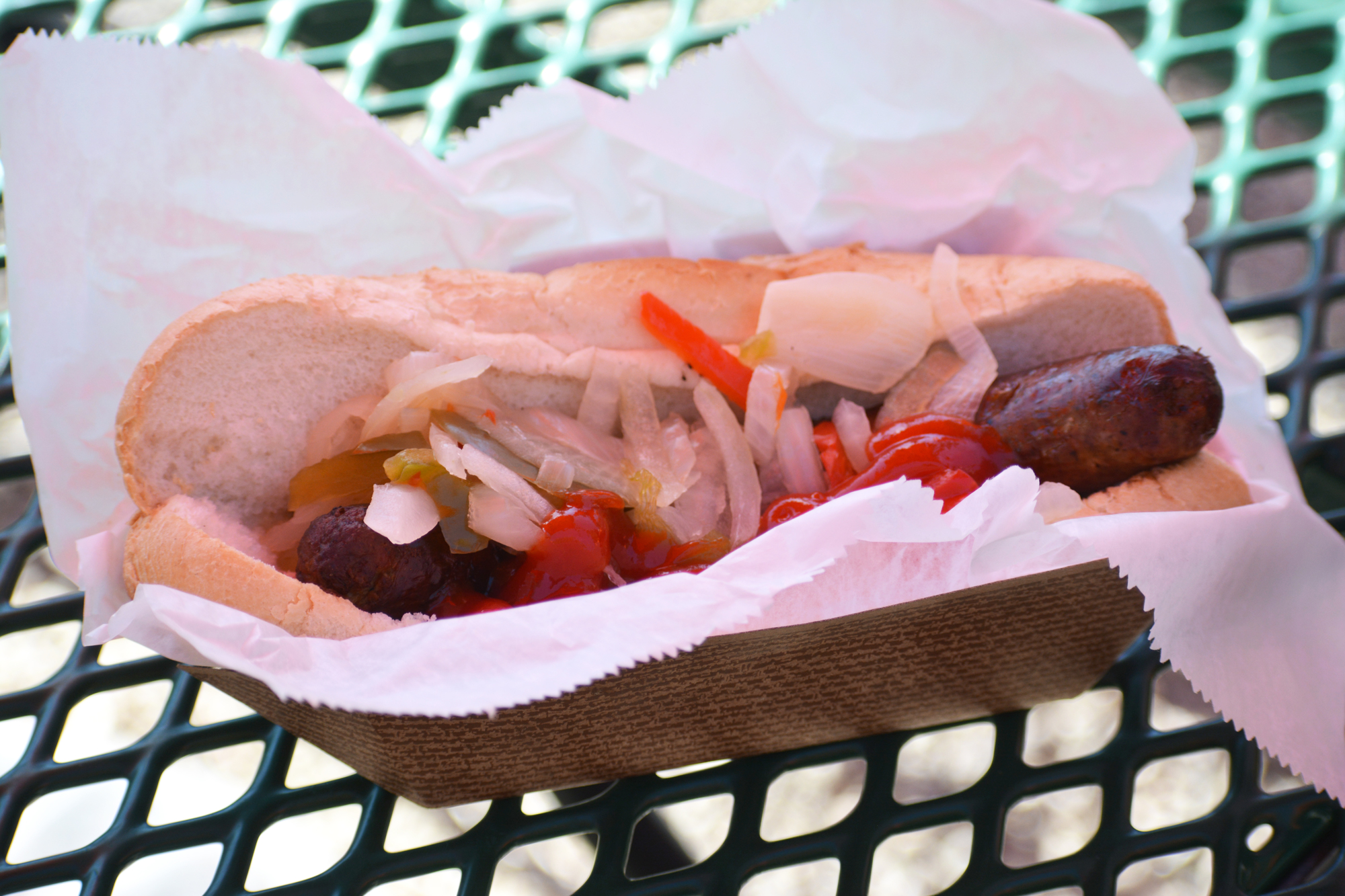 An Italian sausage with peppers and onions from Boog's BBQ.