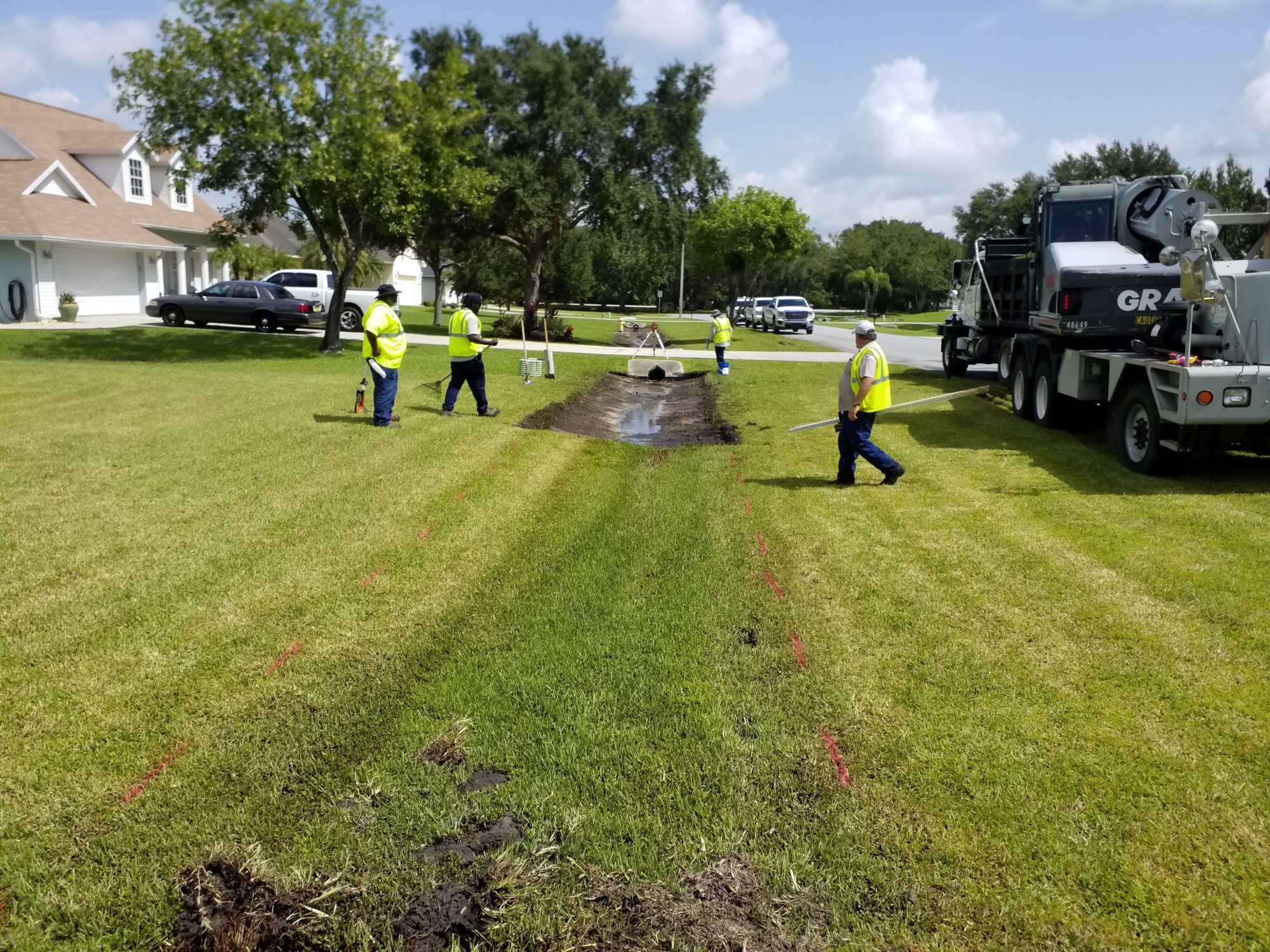 Manatee County crews clean a roadside ditch on 128th Street NE off of Upper Manatee River Road in July 2018. Courtesy photo.
