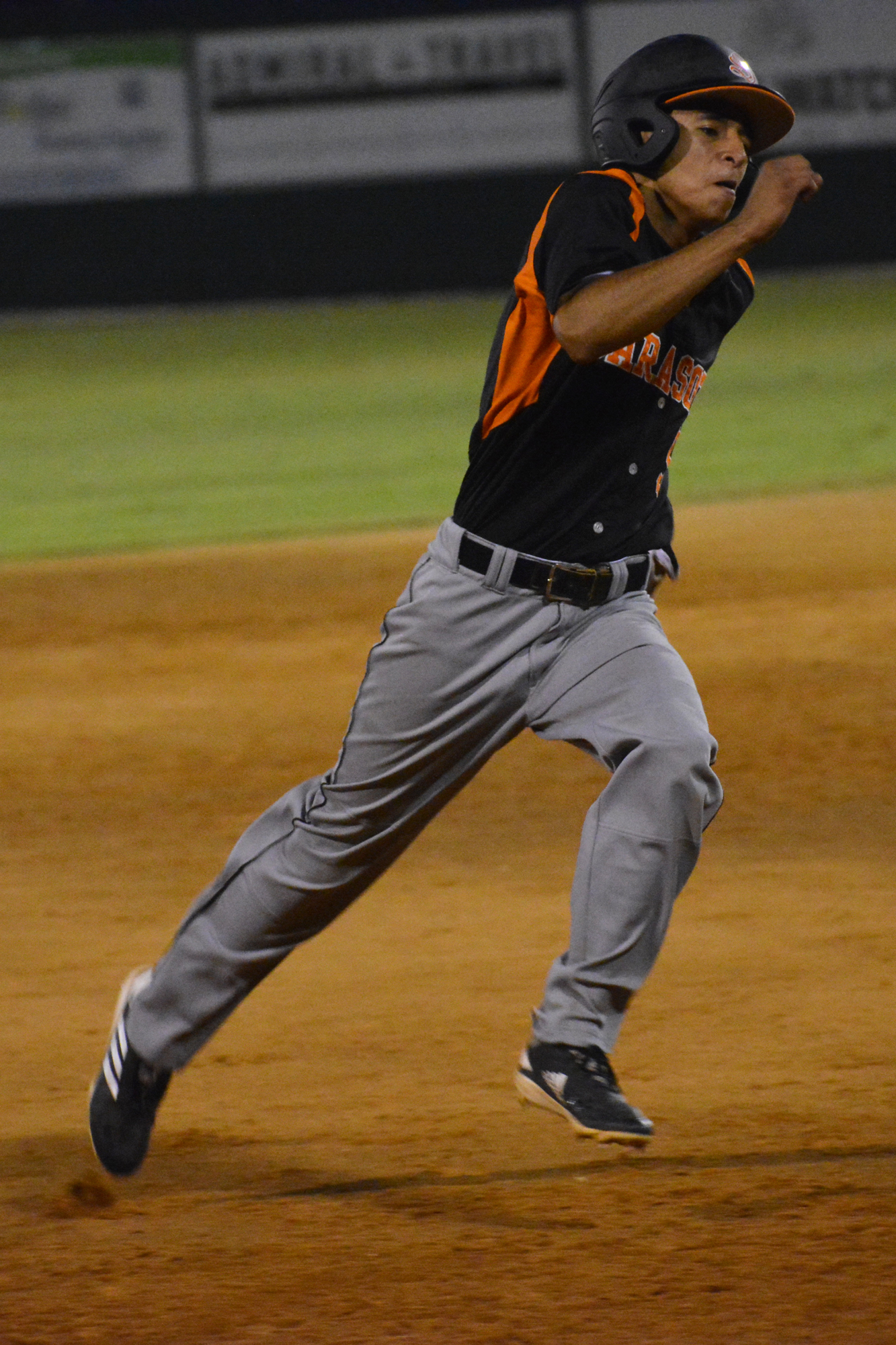 Sailors junior outfielder Uriel Hernandez rounds third base and heads for home to score the game-winning run.