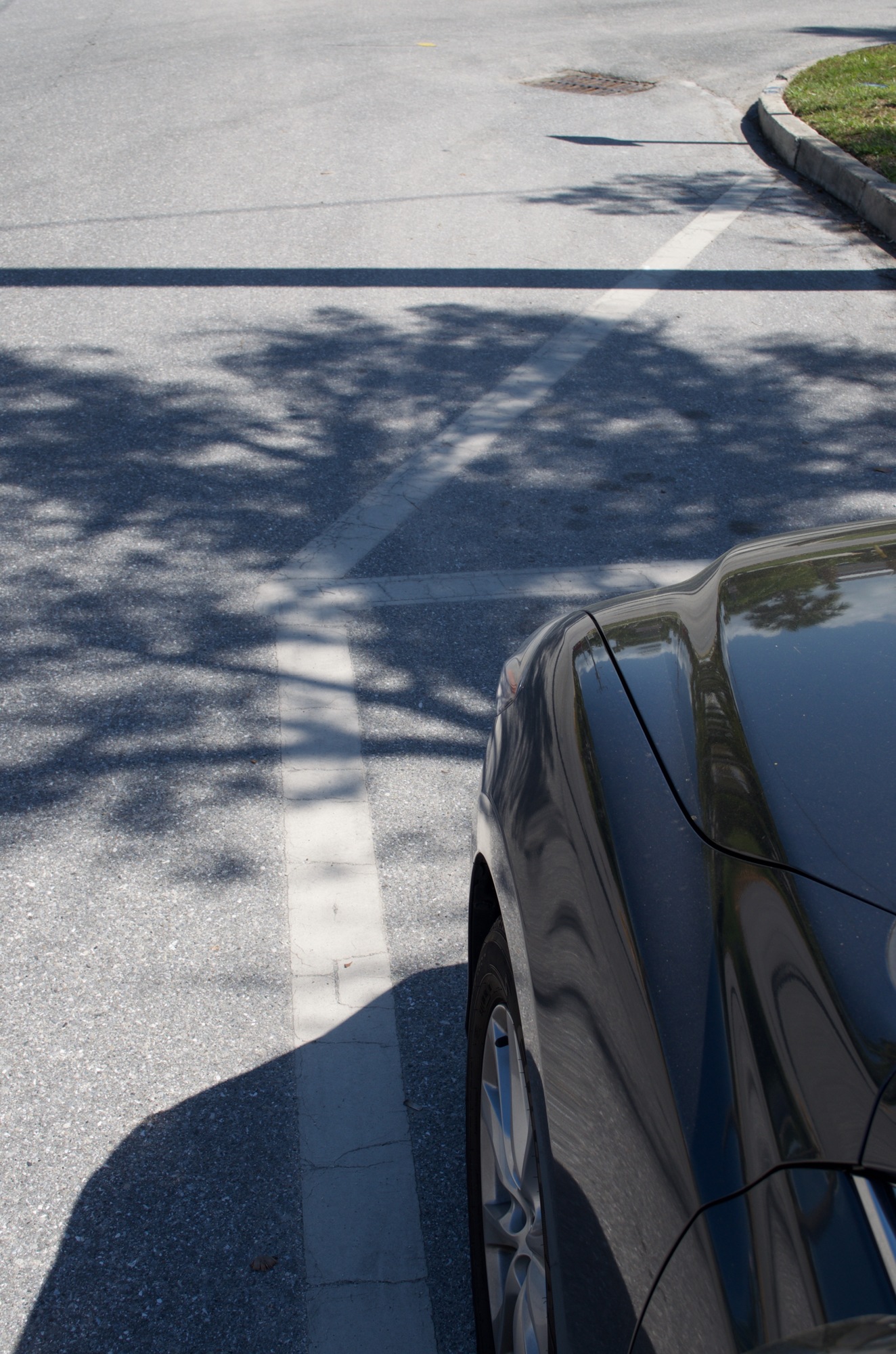 The town gave its initial approval to extending the space between parking and street corners from 30 to 50 feet.