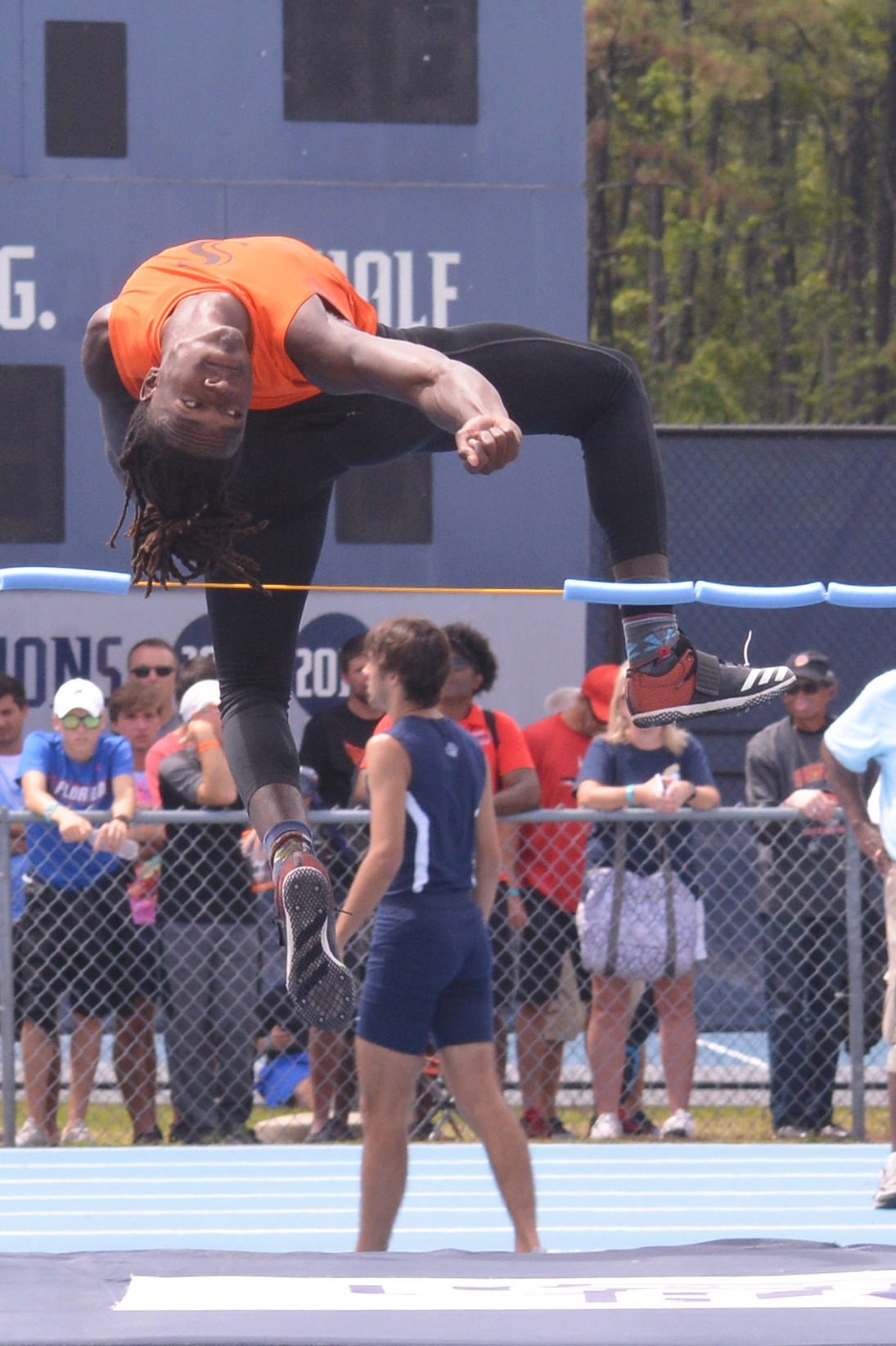 Sarasota senior Robbie Peterson finished third in the high jump (pictured; 6 feet, 5.5 inches) but won the 4A boys triple jump (49 feet, 0.25 inches) .