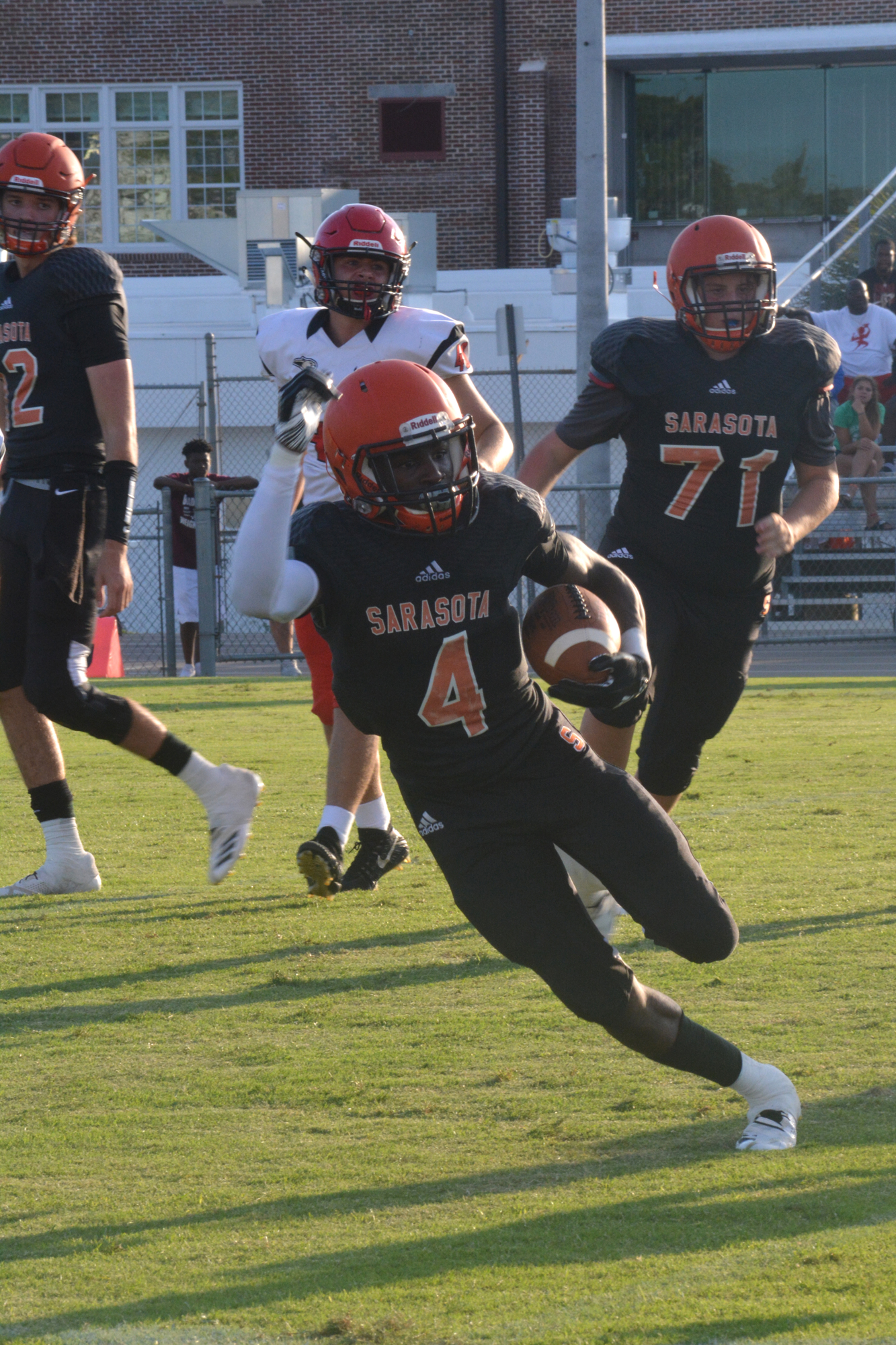 Sarasota wideout Ke'Andre Collins (4) had two touchdowns against the Cougars.
