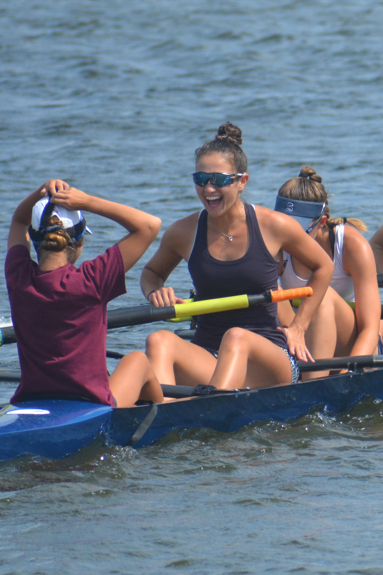 Lakewood Ranch's Isabella Gomez (middle) practices — and laughs —  with her Sarasota Crew girls lightweight 8+ team at Nathan Benderson Park.