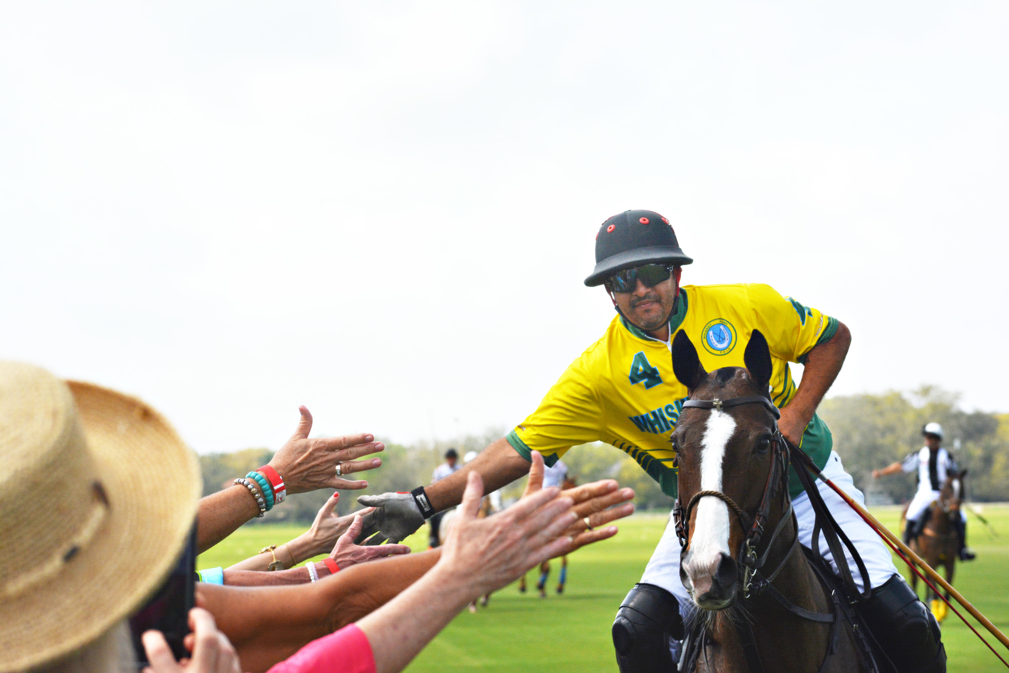 Guillermo Aguero greets fans before a match at the Sarasota Polo Club.