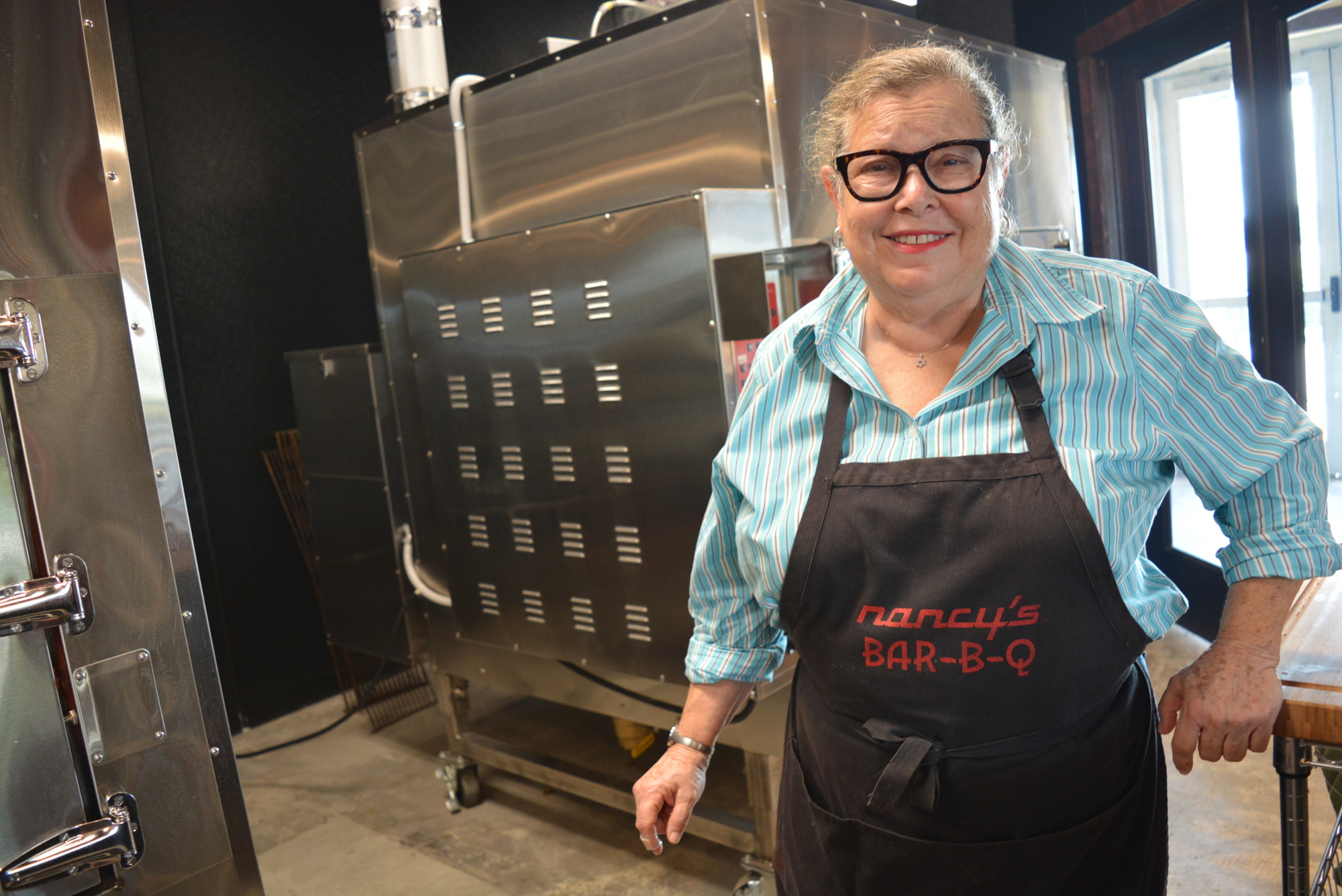 Two 500-pound smokers at the new Lakewood Ranch location will provide food for Lakewood Ranch patrons as well as catering customers, says Nancy's Bar-B-Q founder Nancy Krohngold.