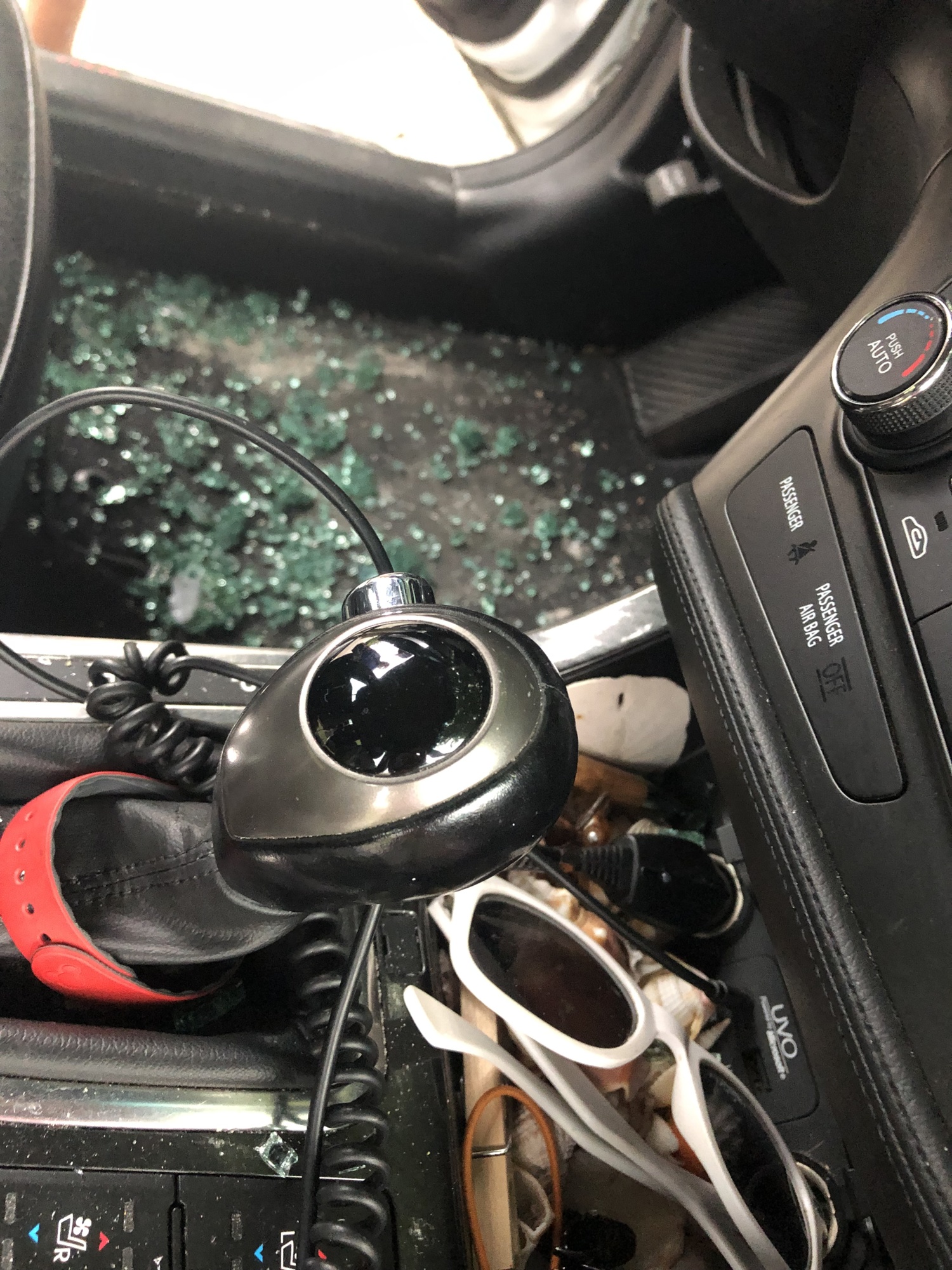 Glass shards litter the inside of Loccisano's vehicle. Photo courtesy of Sheila Loccisano. 