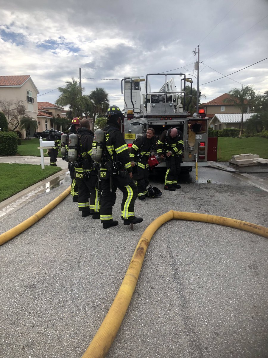 Firefighters at the scene of the fire. Photo courtesy of the Town of Longboat Key's Twitter account. 
