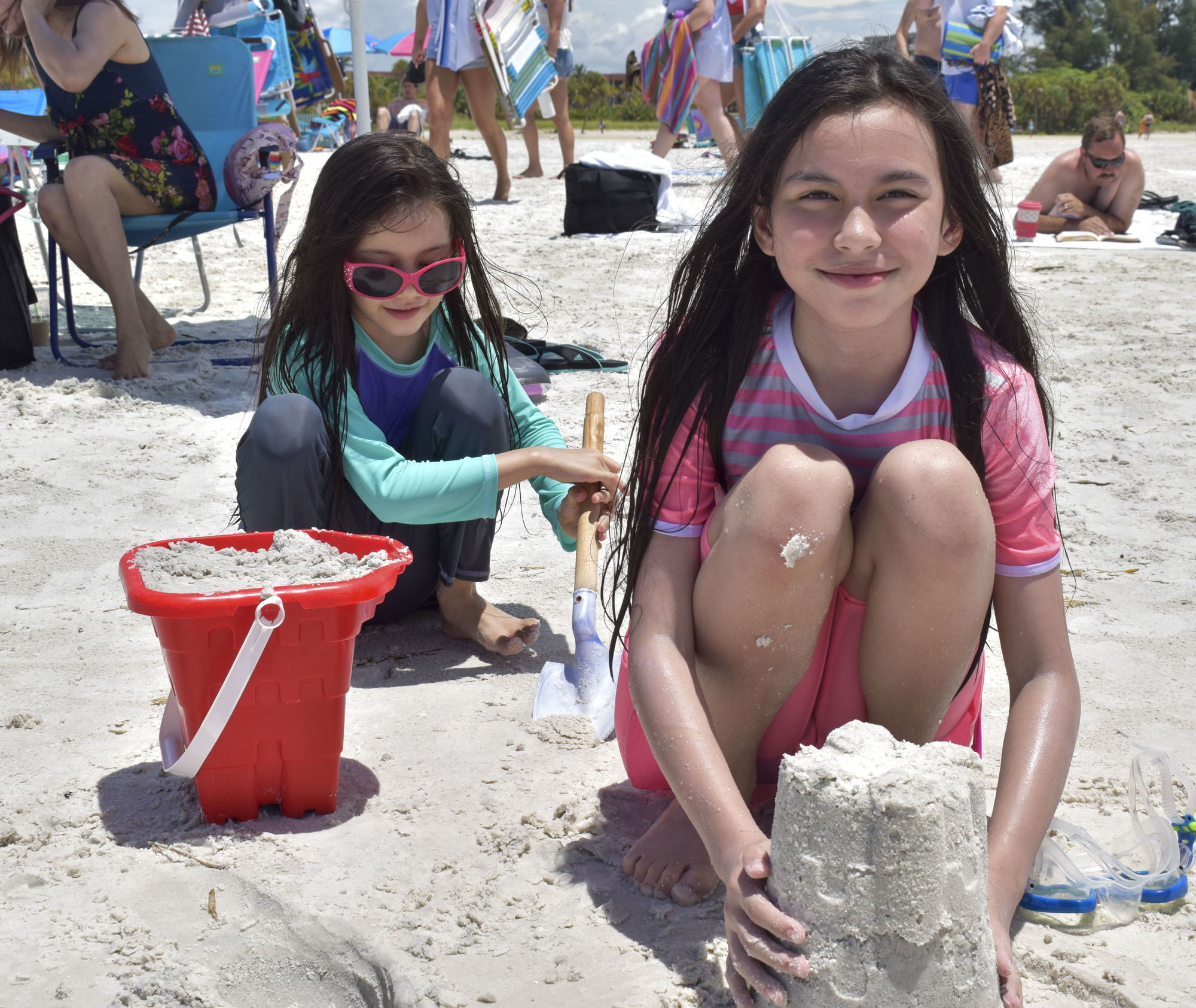 Sisters Monica, 6, and Angela Kaplan, 10, visit Siesta Beach from Georgia.