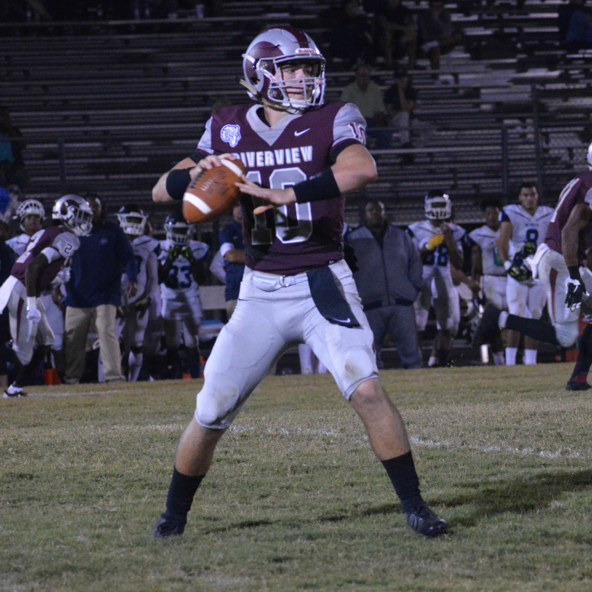 Riverview High quarterback Sean White looks for an open receiver downfield.