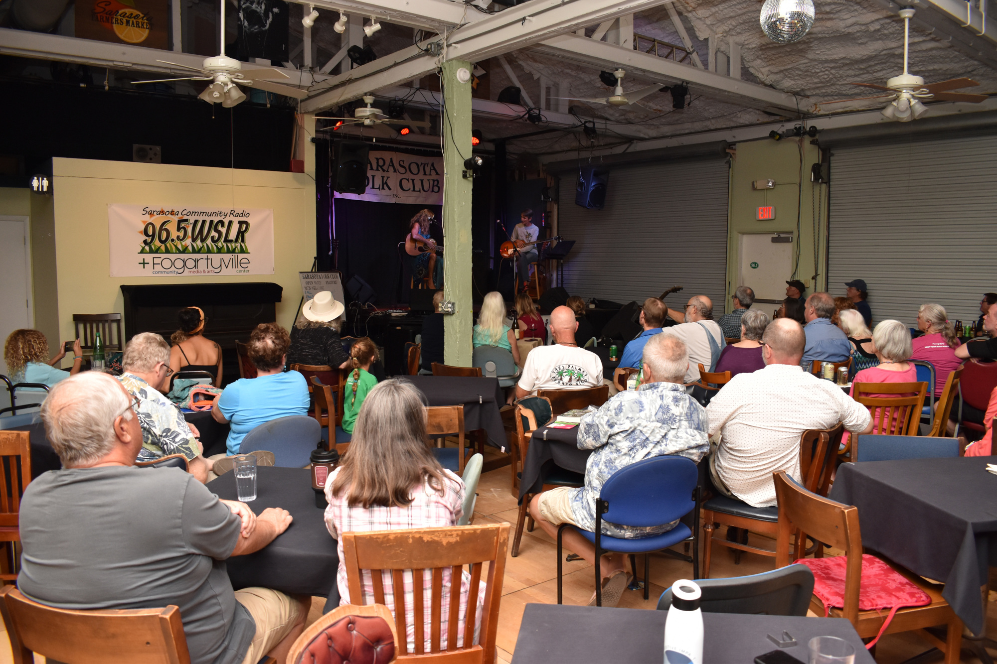 Fogartyville Community Media and Arts Center was packed July 29 for the Sarasota Folk Club's new monthly open mic and concert series at the center. Photo by Niki Kottmann