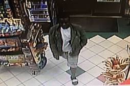 One of the suspects who robbed a local convenience store of cigarettes.