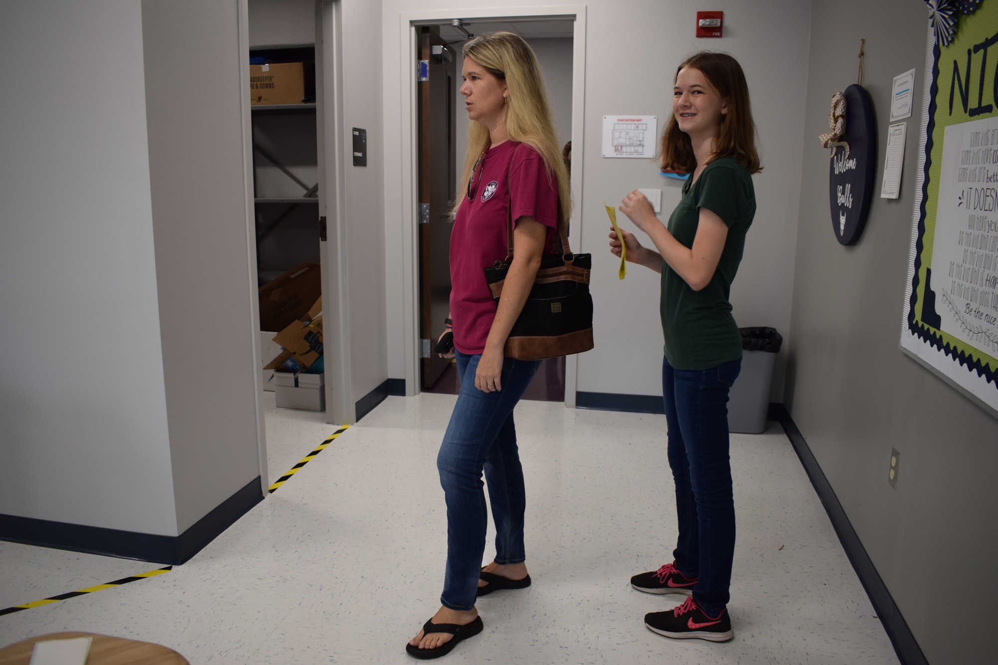 Shelly Goforth, left, and her daughter Emily, 13, view a math classroom at Parrish Community High School while touring the campus Tuesday evening. Emily Goforth will be a freshman at the school.