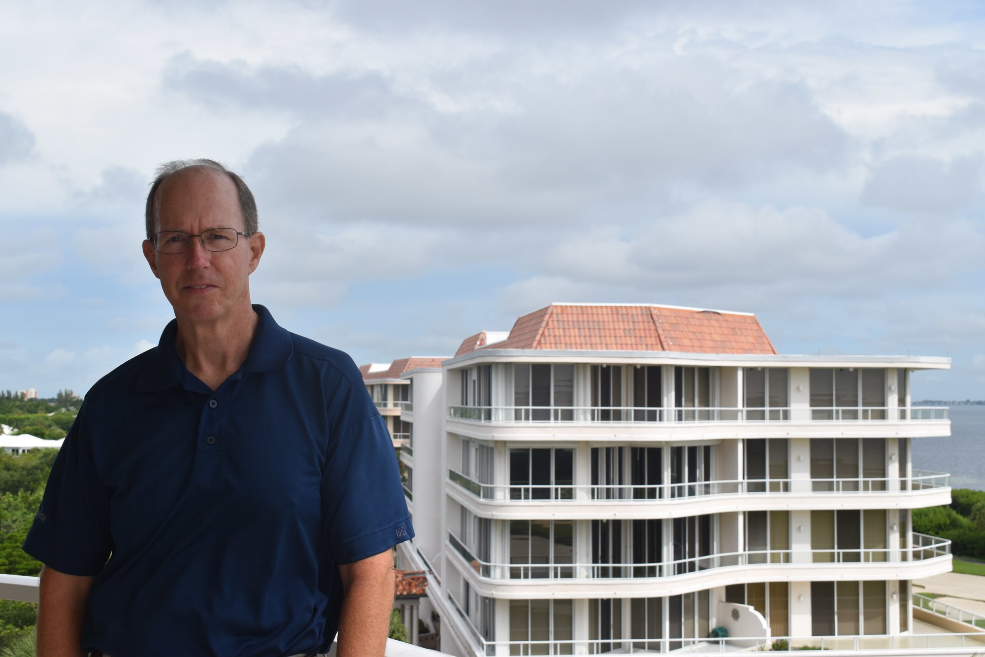 Mike Purdum on the deck of his Longboat Key condo.