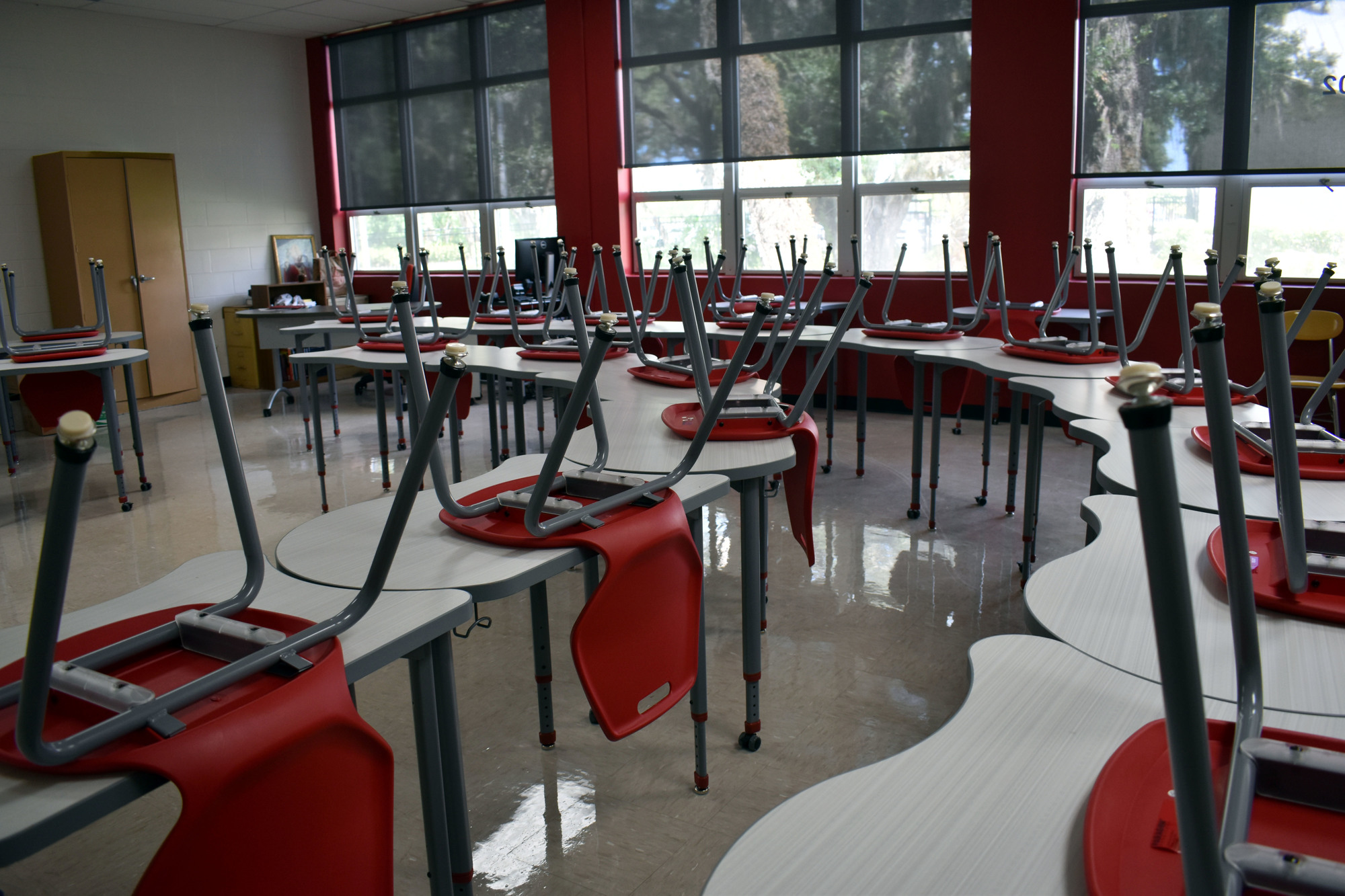 The new desks can be moved into a variety of positions to suit educational needs. 
