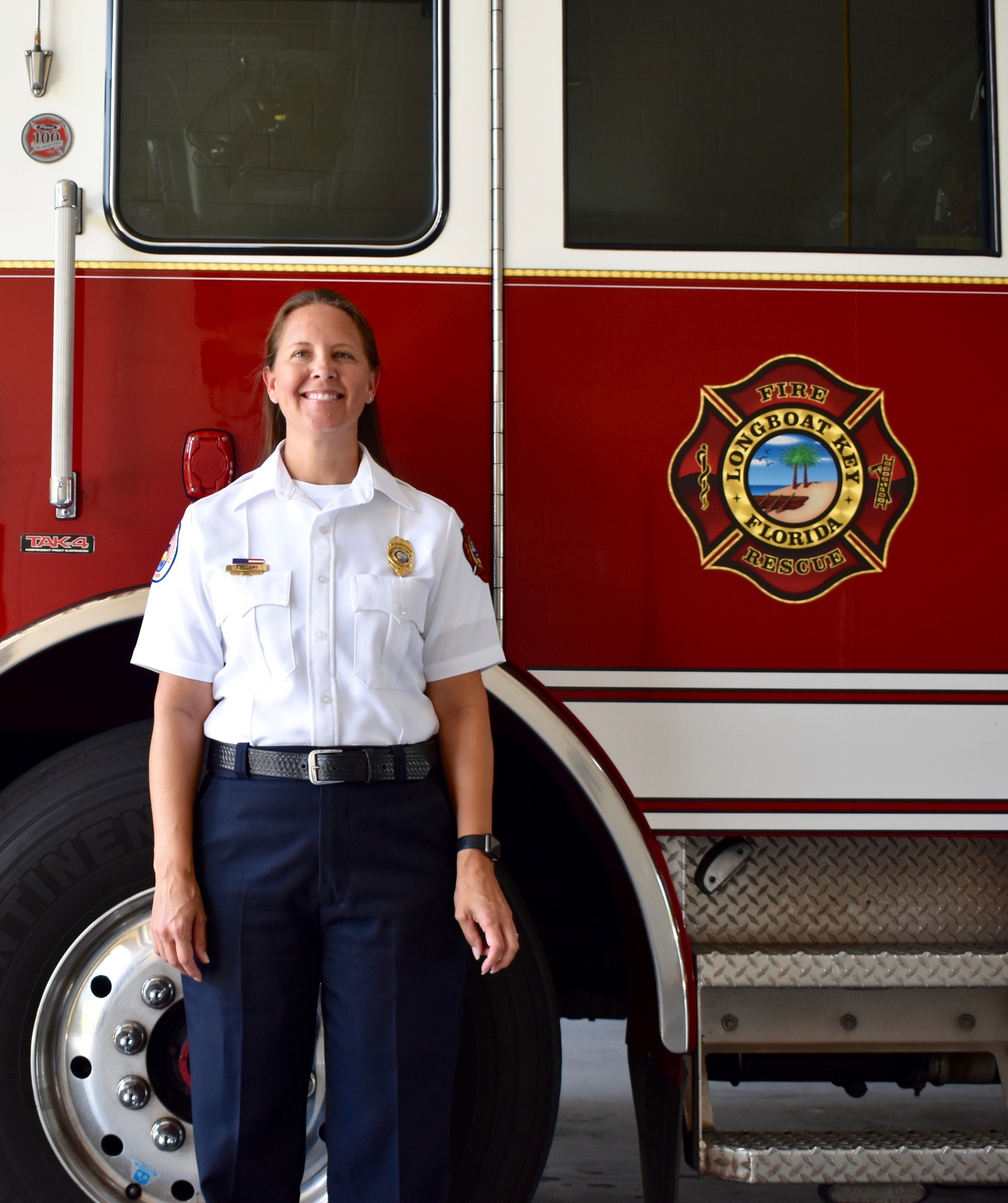 Tina Adams is doing it all for Longboat Key emergency services. 