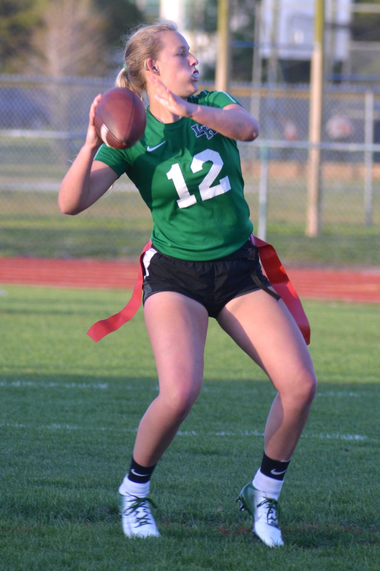 Former Lakewood Ranch High flag football quarterback Spencer Mauk drops back to pass. The Premier Flag Football League would prepare girls for the high school level.