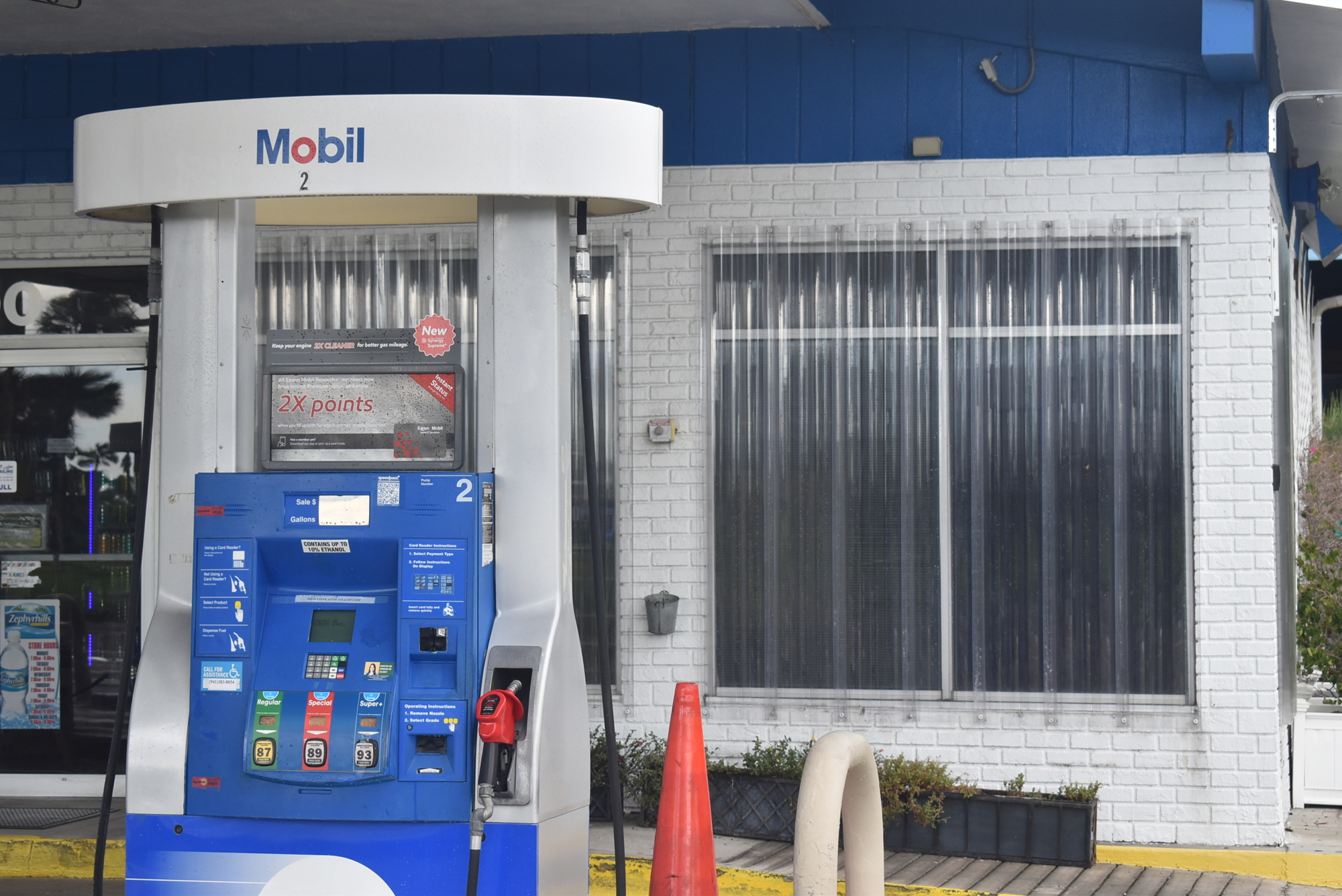 The island's only gas station put up its hurricane shutters. Photo by Nat Kaemmerer.