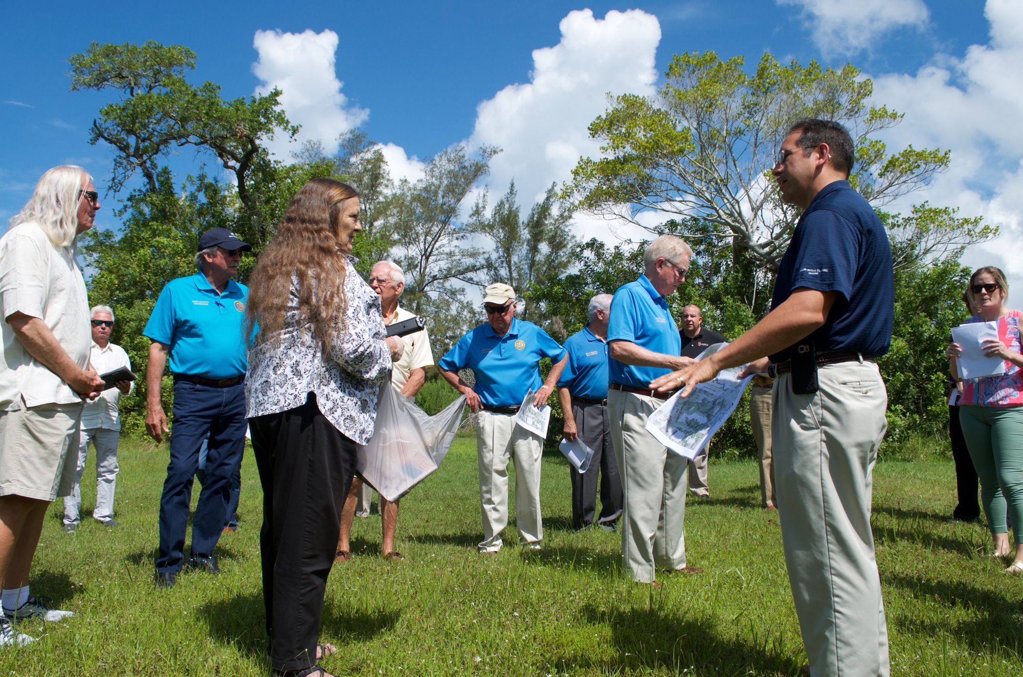 Commissioners and members of the public and town staff toured the Town Center land in June.