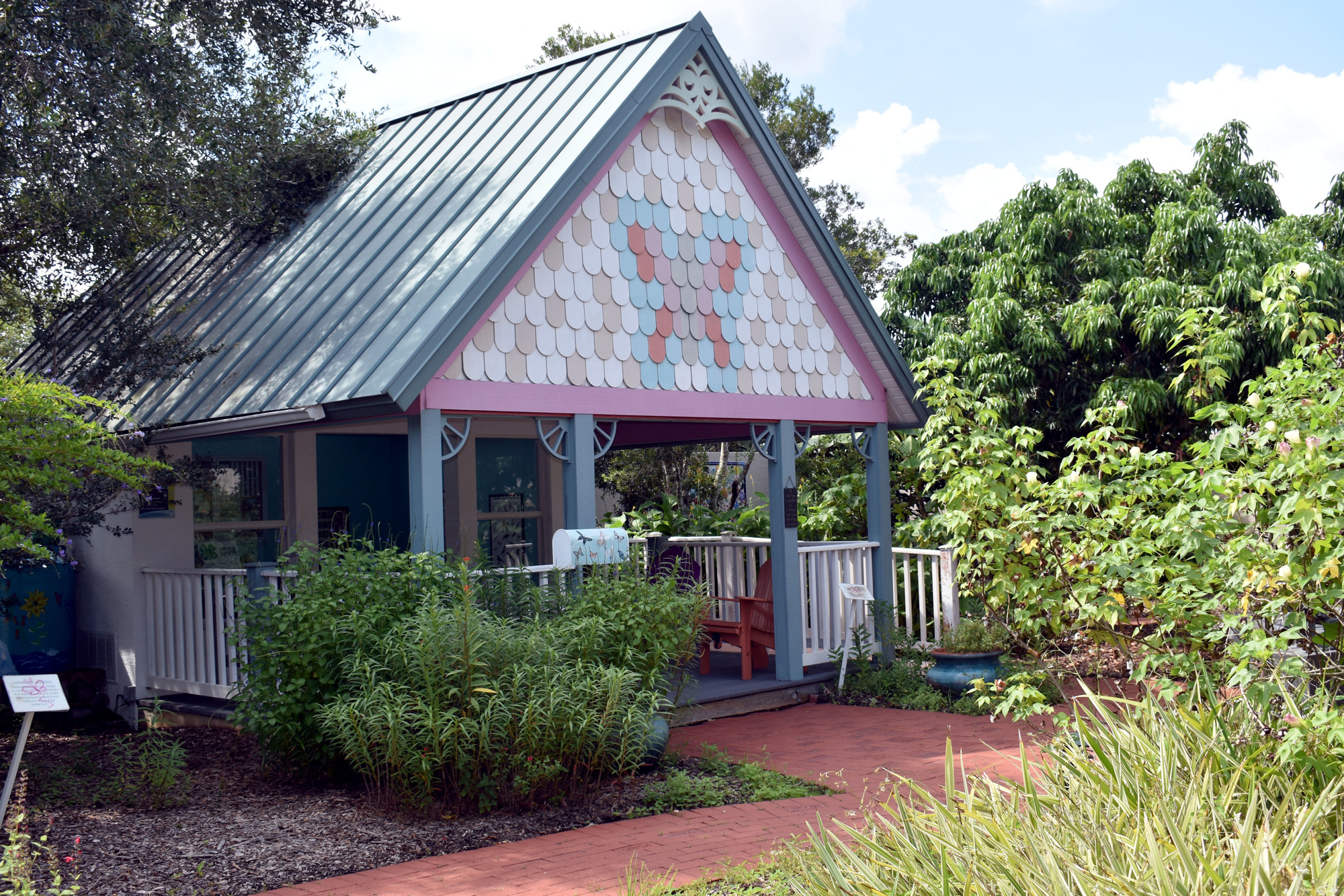 Children can enjoy reading and exploring in a cabin in the gardens at the Fruitville Library.