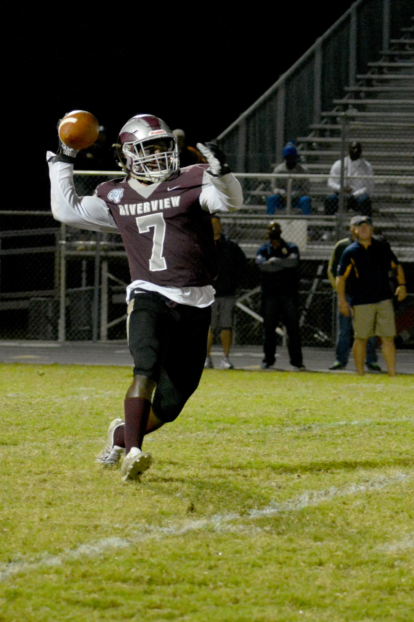 Michael Hayes launches a wide receiver pass to his brother, Omari Hayes, for an 80-yard touchdown.