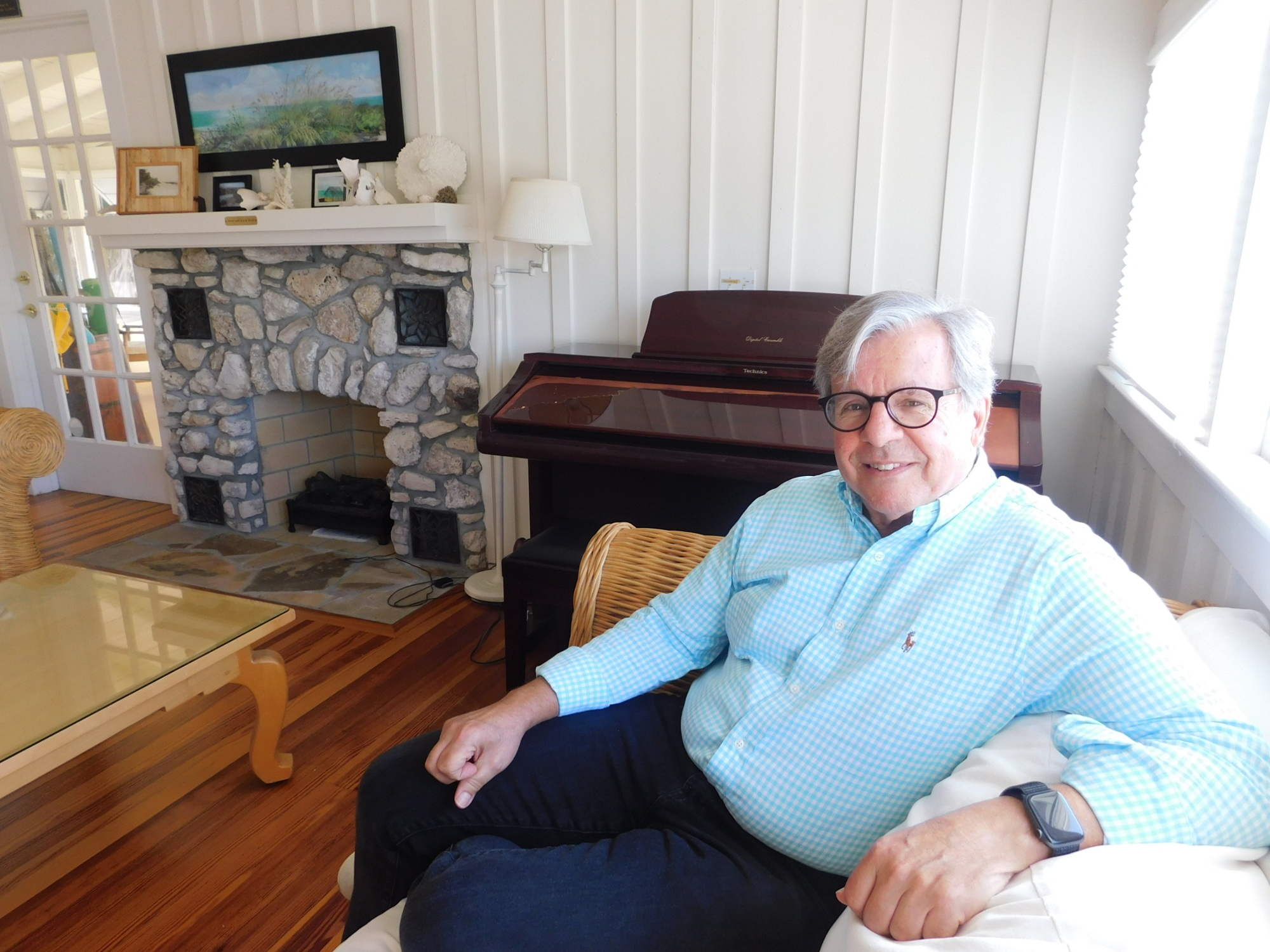 Rodgers, seated in the living room at the Hermitage House, believes one of the keys to running a successful artist retreat is a relaxed comfortable atmosphere.  (Klint Lowry)