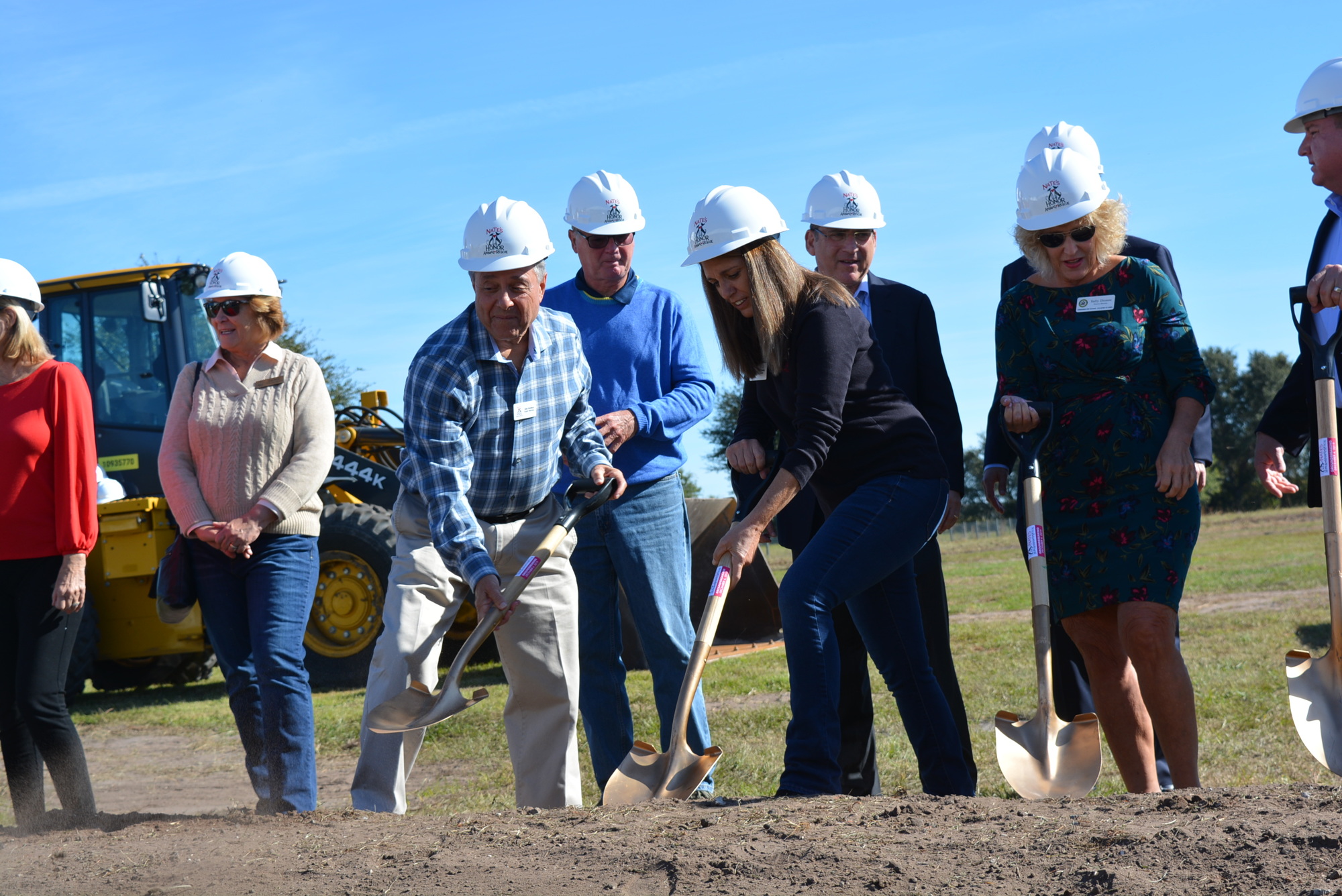 Nate's Honor Animal Rescue Board President Al Wolfson and Executive Director Dari Oglesby join other officials and board members in a ceremonial groundbreaking ceremony Dec. 6. Construction is expected to last about one year.