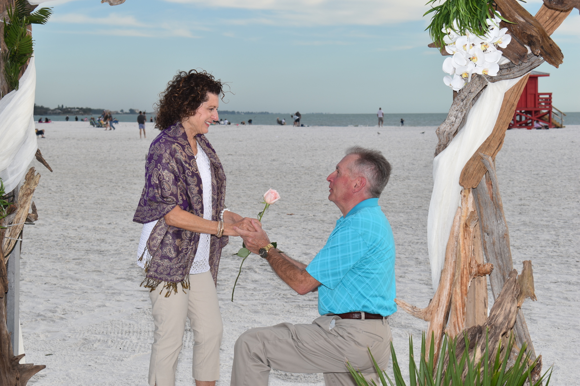 About 400 couples renewed their vows on Siesta Beach on Feb. 14.