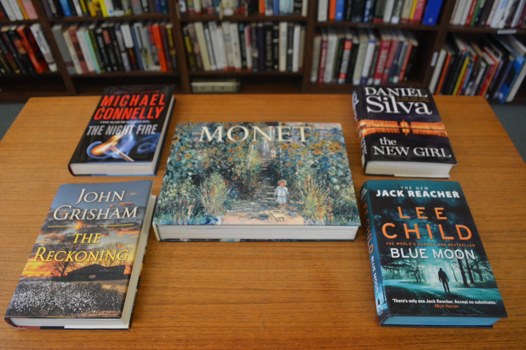 A Monet art book and novels written by John Grisham, Daniel Silva, Michael Connelly and Lee Child are among  the books the library is advertising as 