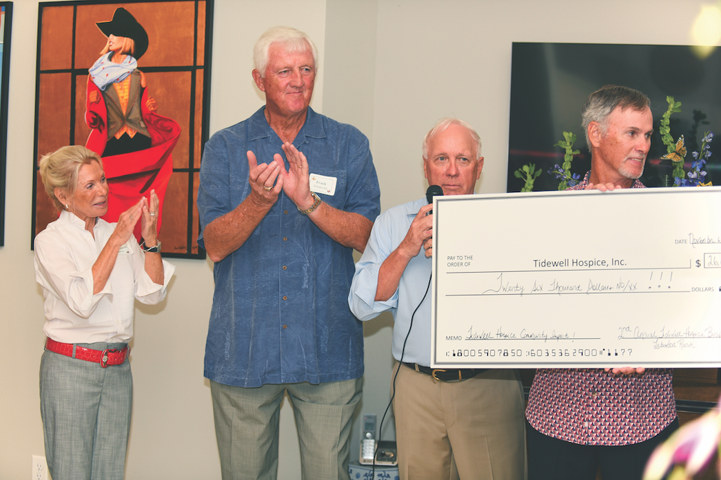 On Nov. 6, Esplanade residents Mary Frances Emerson, Frank Fitzgerald, Vic Emerson and Ron Rippo presented a $26,000 check to Tidewell Hospice at a charity cocktail party hosted by the Emersons for the second year in a row.