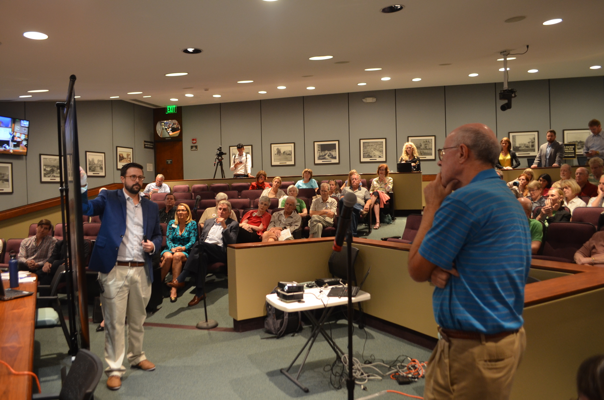 Chris Cianfaglione, left, addresses a speaker's question about traffic gridlock and circulation at a community workshop at City Hall on Wednesday, Jan. 15.