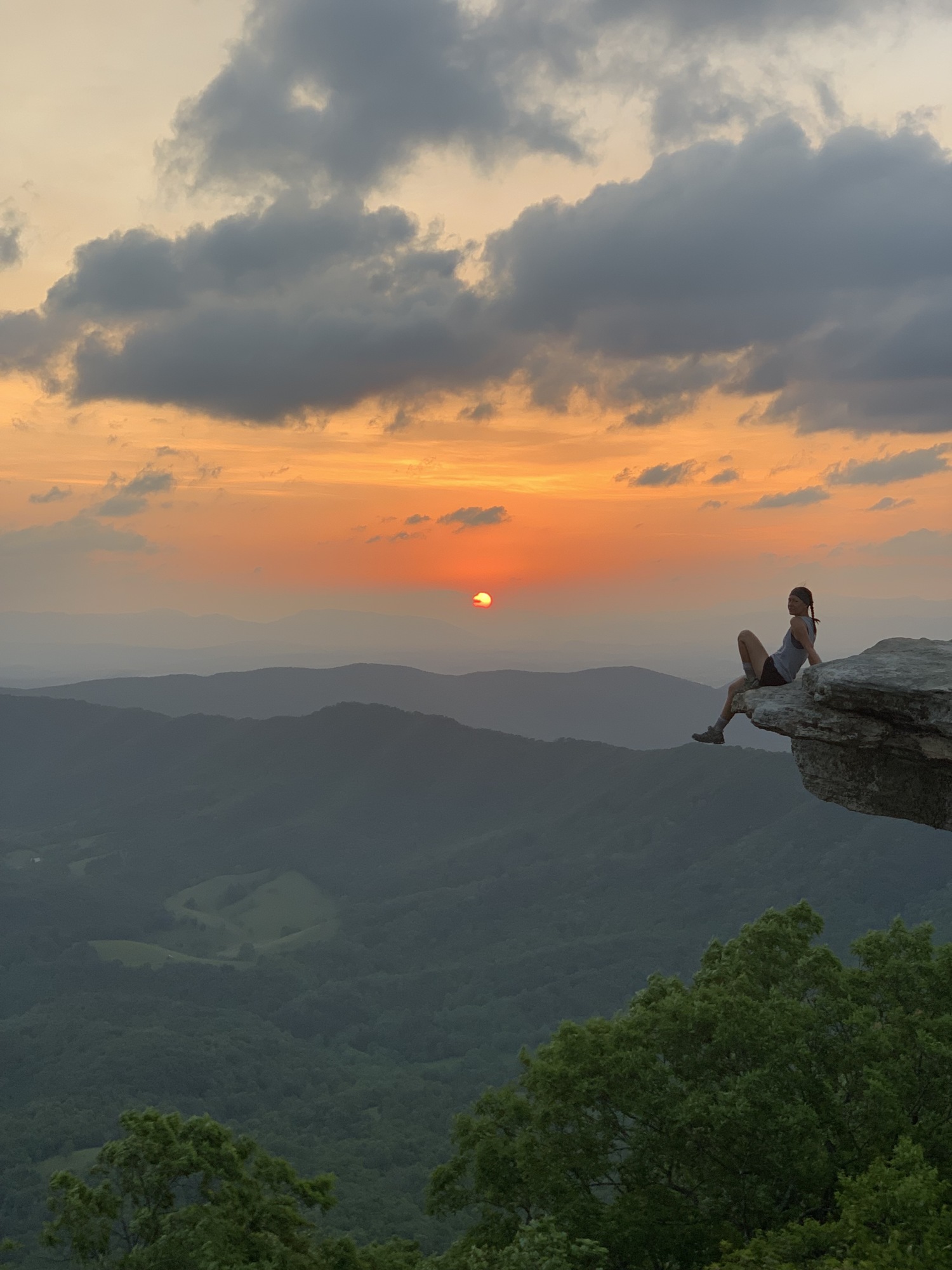 Tatum Temple dangles off of McAfee Knob in Catawba, Va. It is the most photographed spot along the trail, Temple said. Photo courtesy Tatum Temple.