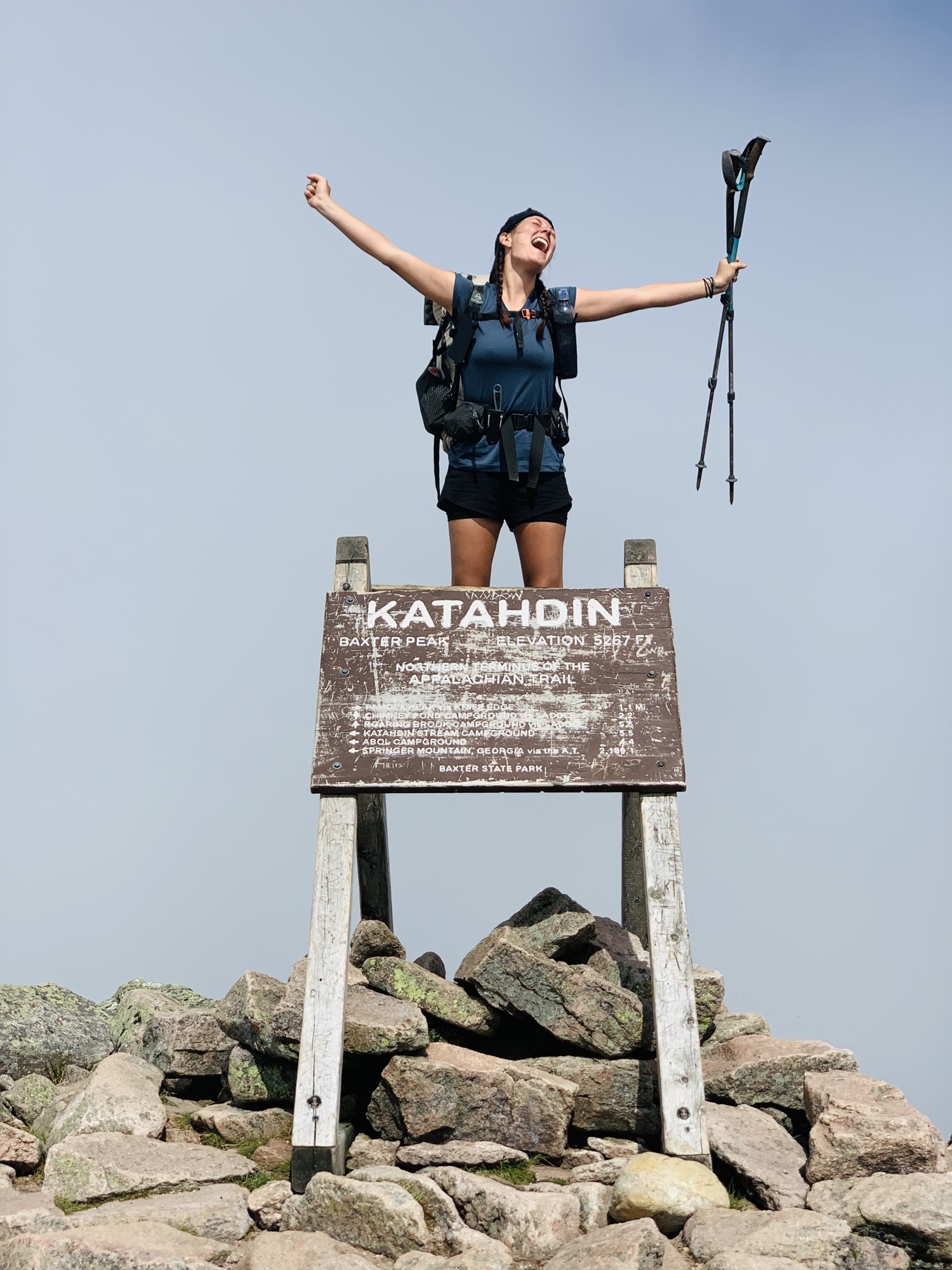 Tatum Temple lets out a scream of relief while standing at the peak of Mount Katahdin in Piscataquis, Maine. The peak marks the end of the Appalachian Trail. Photo courtesy Tatum Temple.